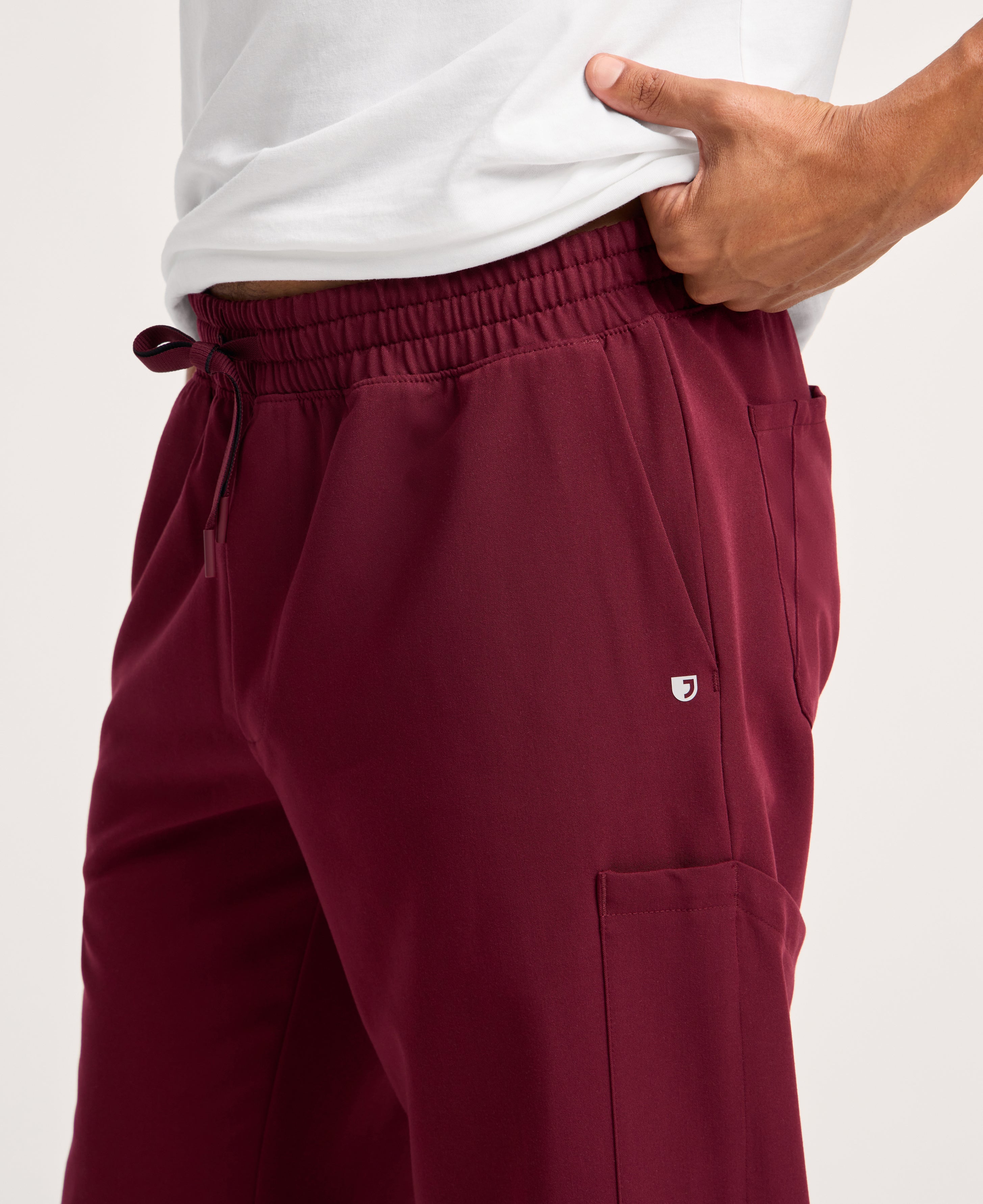 Jaanuu Osmo 8-Pocket Scrub Jogger in Burgundy, product photo 2 of 6
