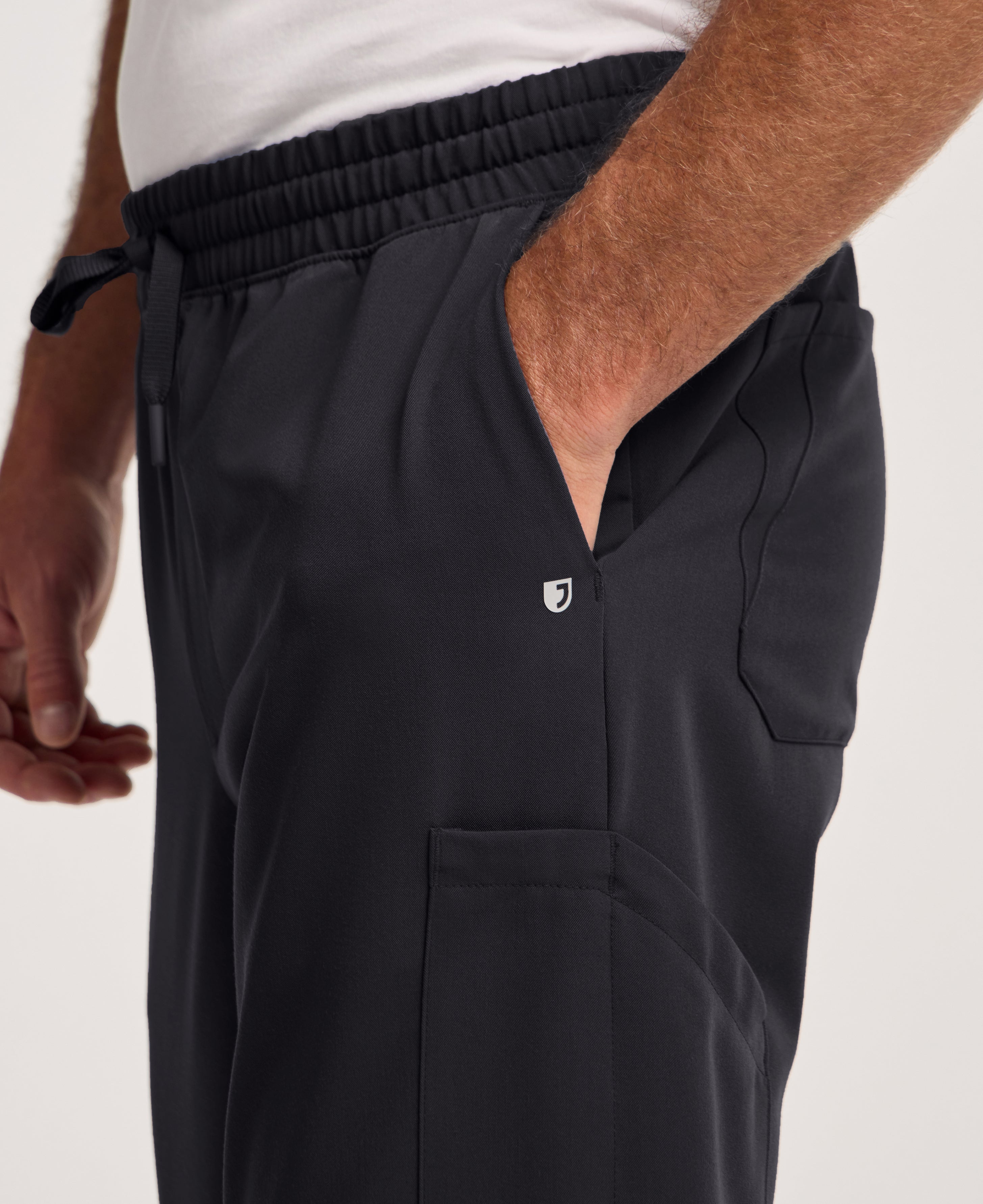 Jaanuu Osmo 8-Pocket Scrub Jogger in Black, product photo 2 of 6
