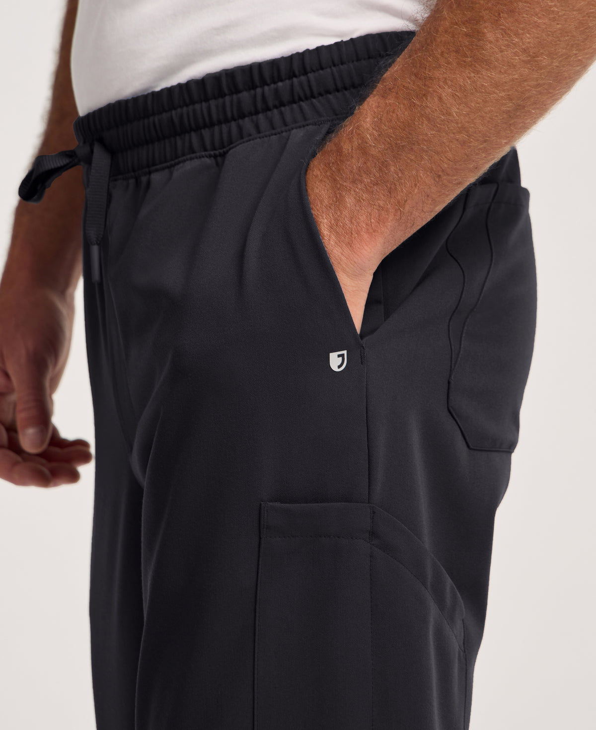 Jaanuu Osmo 8-Pocket Scrub Jogger in Black, product photo 2 of 6
