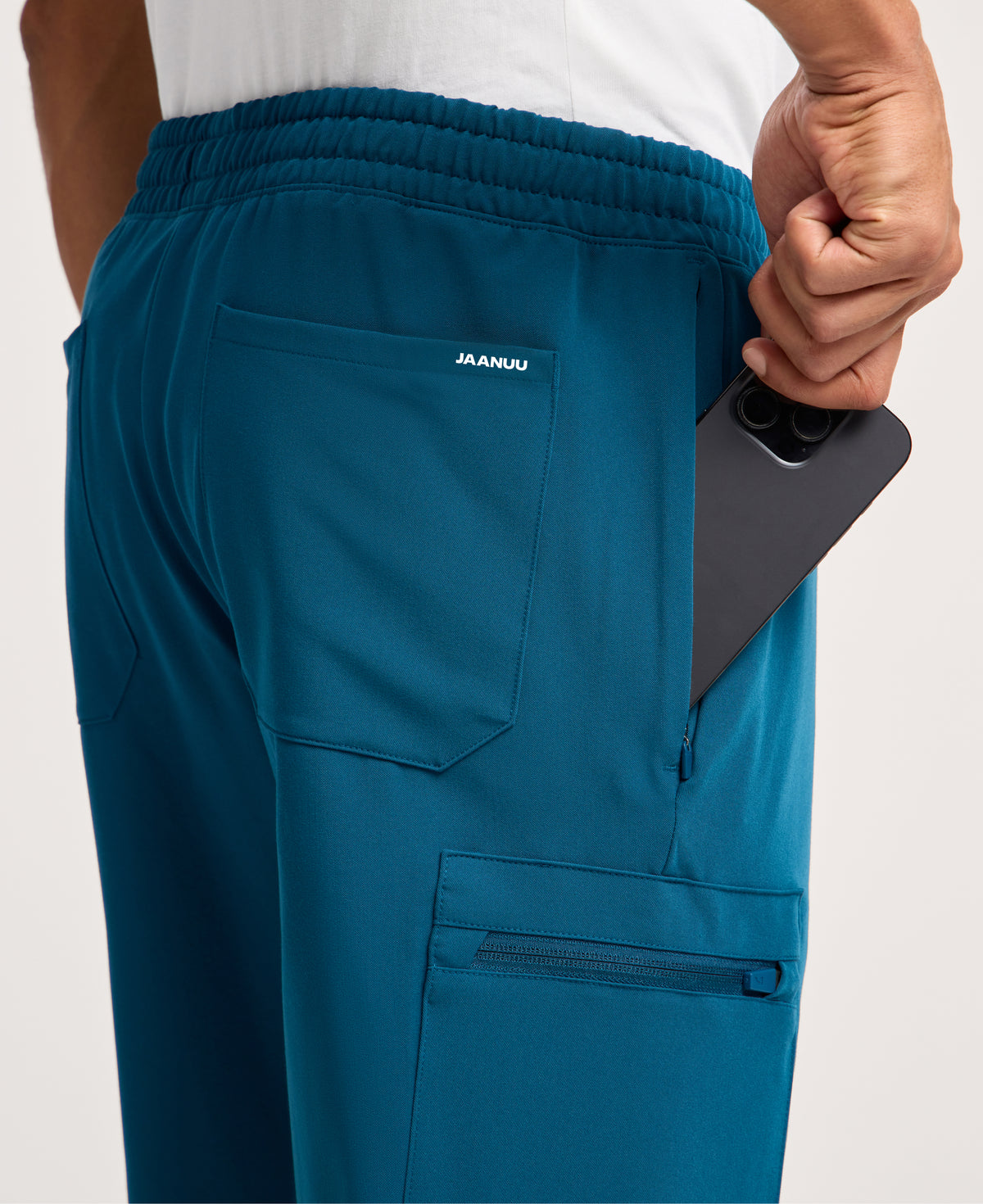 Jaanuu Osmo 8-Pocket Scrub Jogger in Caribbean Blue, product photo 3 of 6