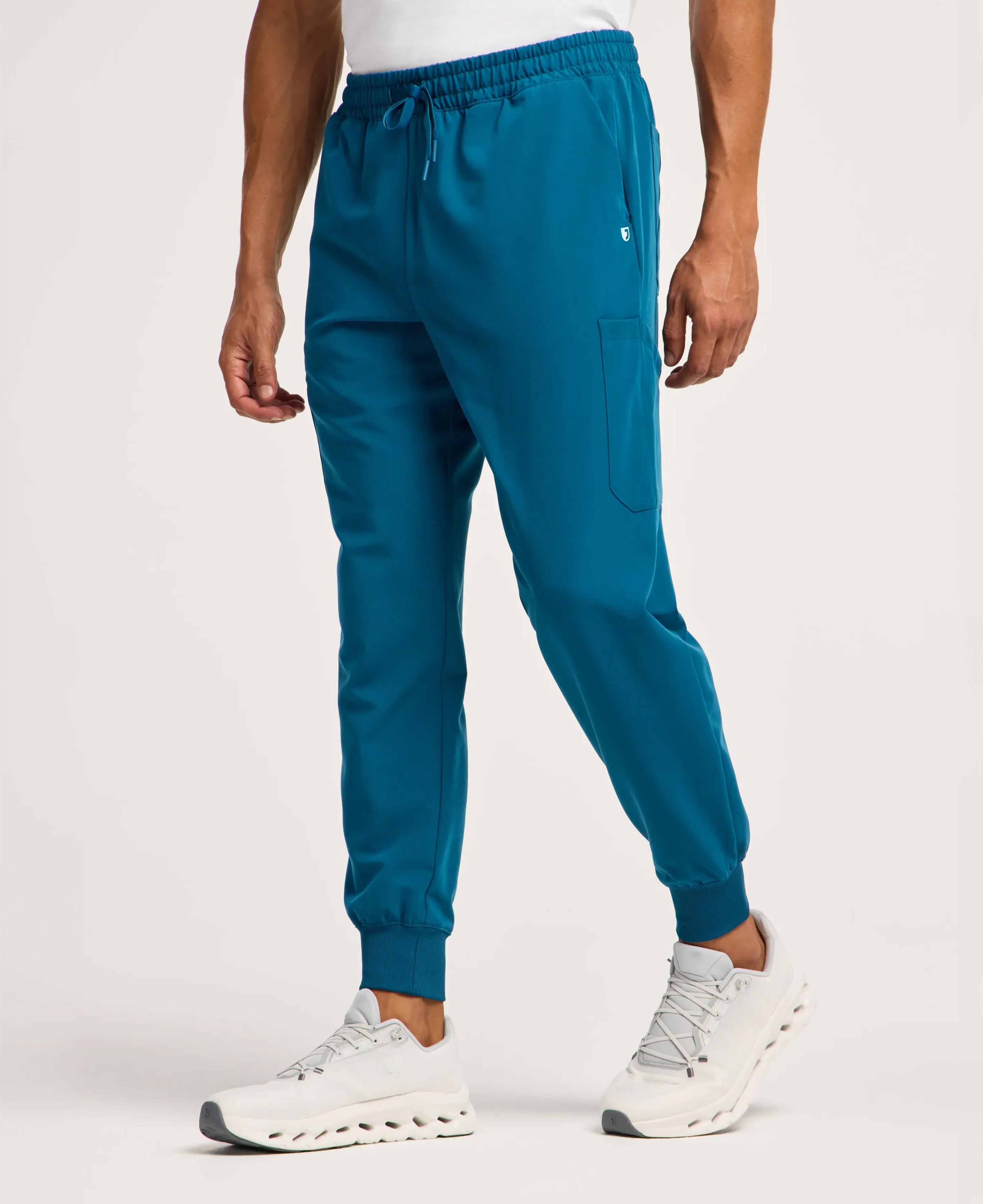 Jaanuu Osmo 8-Pocket Scrub Jogger in Caribbean Blue, product photo 4 of 6
