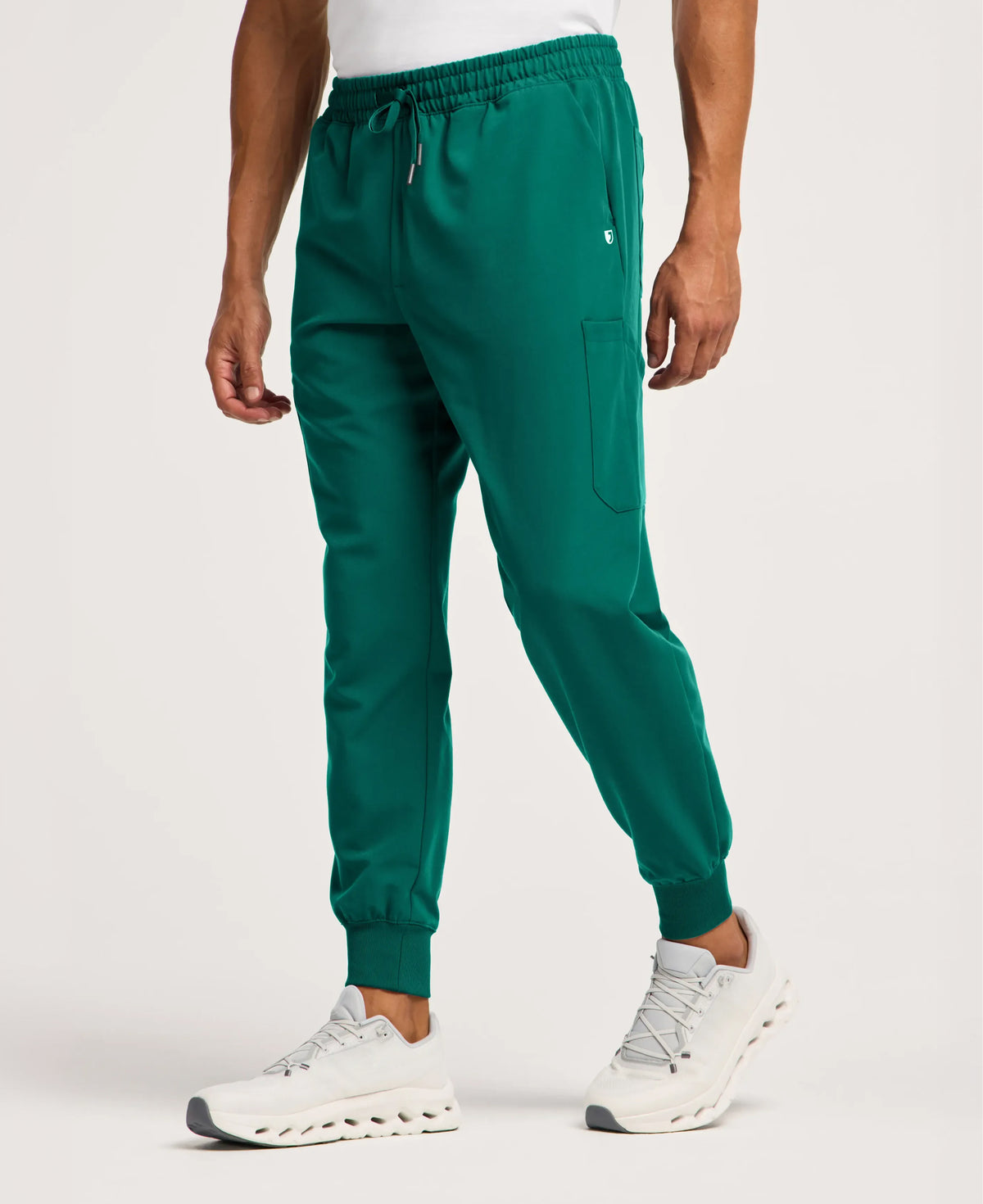 Jaanuu Osmo 8-Pocket Scrub Jogger in Hunter Green, product photo 1 of 6