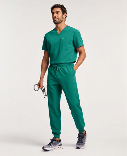 Jaanuu Osmo 8-Pocket Scrub Jogger in Hunter Green, product photo 2 of 6