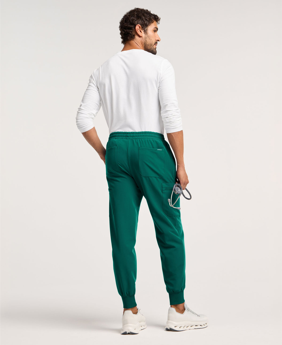 Jaanuu Osmo 8-Pocket Scrub Jogger in Hunter Green, product photo 4 of 6