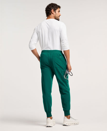 Jaanuu Osmo 8-Pocket Scrub Jogger in Hunter Green, product photo 4 of 6