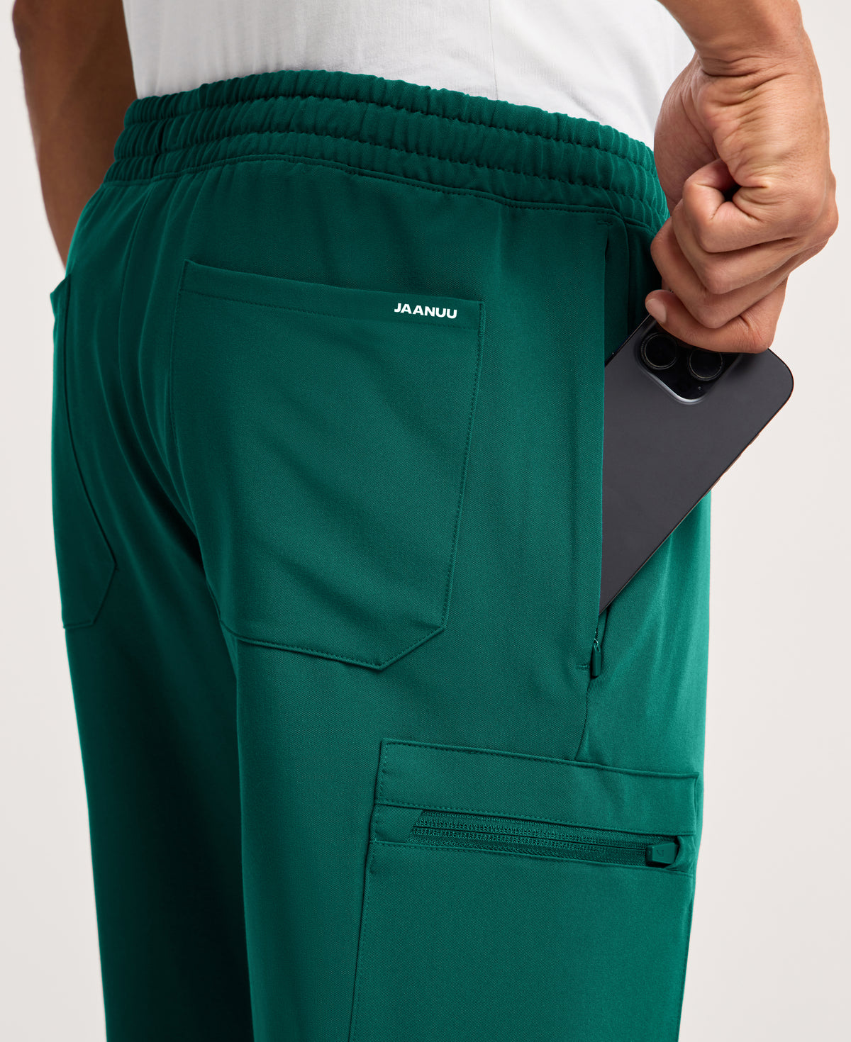 Jaanuu Osmo 8-Pocket Scrub Jogger in Hunter Green, product photo 5 of 6