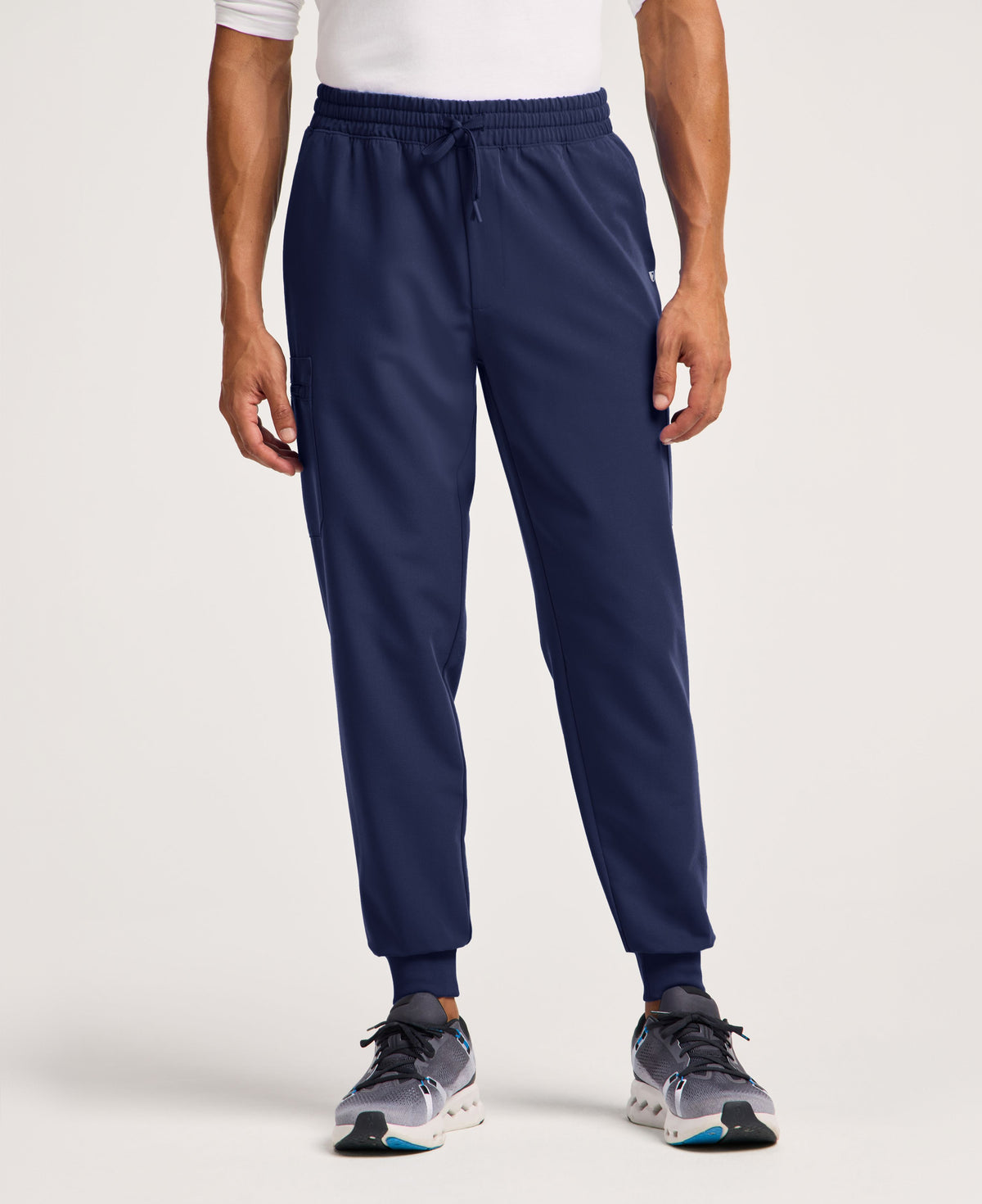 Jaanuu Osmo 8-Pocket Scrub Jogger in Midnight Navy, product photo 1 of 6