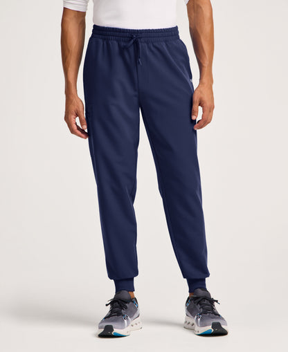Jaanuu Osmo 8-Pocket Scrub Jogger in Midnight Navy, product photo 1 of 6