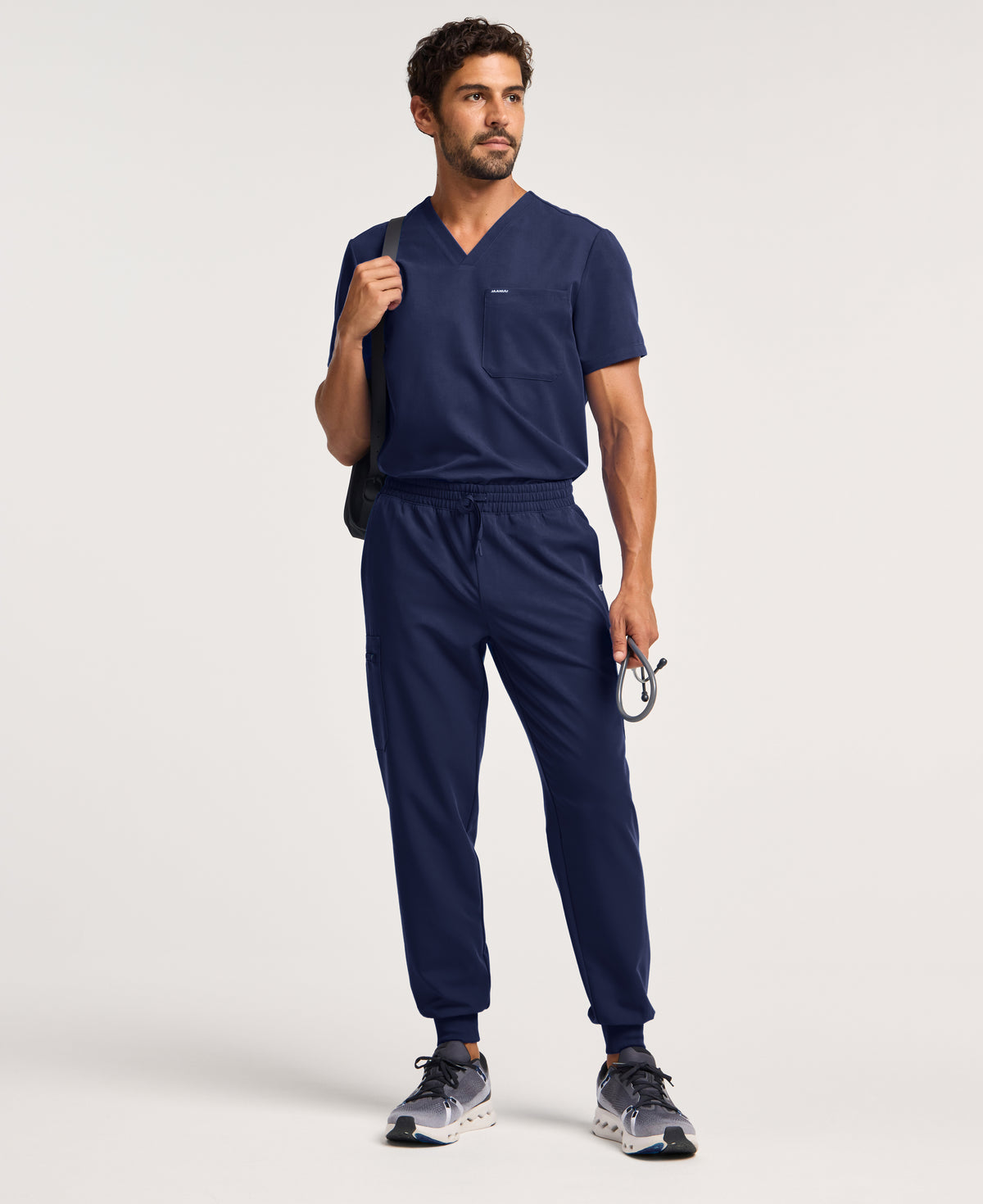 Jaanuu Osmo 8-Pocket Scrub Jogger in Midnight Navy, product photo 3 of 6