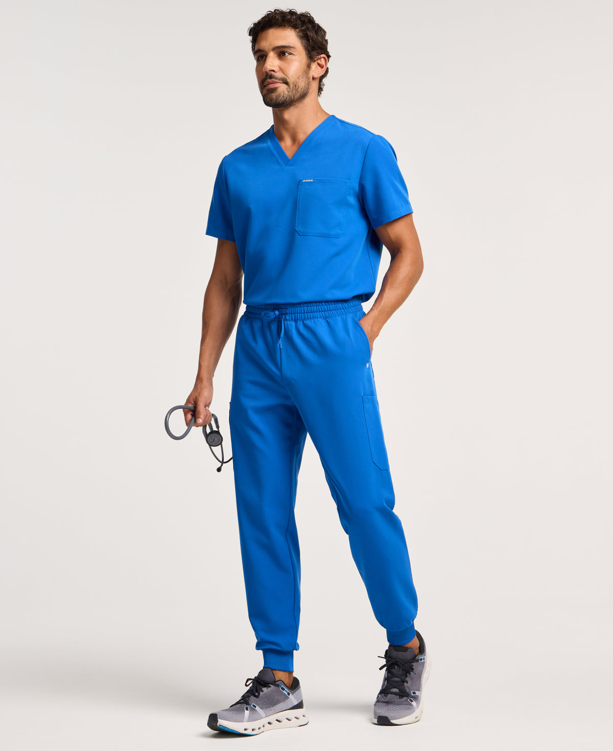 Jaanuu Osmo 8-Pocket Scrub Jogger in Royal Blue, product photo 1 of 6