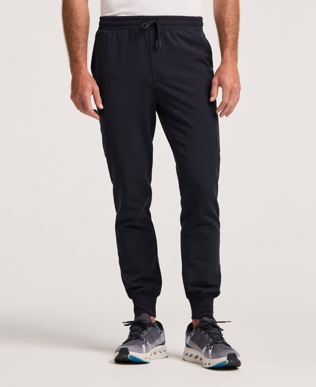 Jaanuu Osmo Slim 8-Pocket Scrub Jogger in Black, product photo 1 of 6