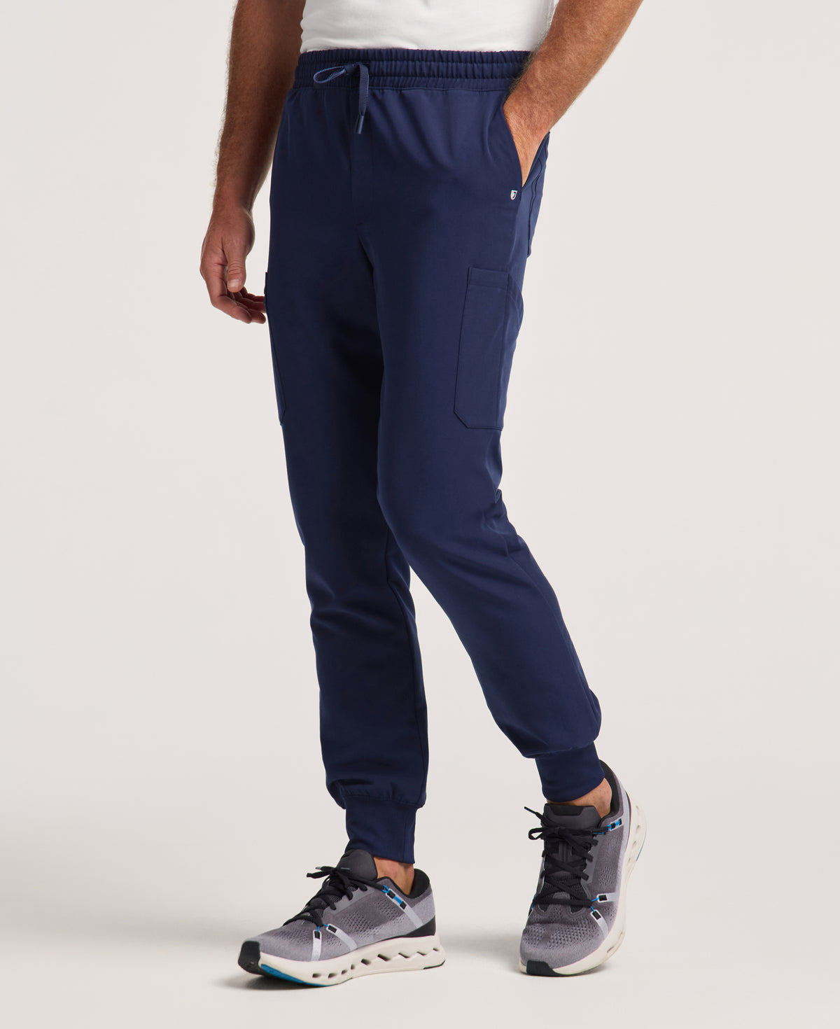 Jaanuu Osmo Slim 8-Pocket Scrub Jogger in Midnight Navy, product photo 1 of 6