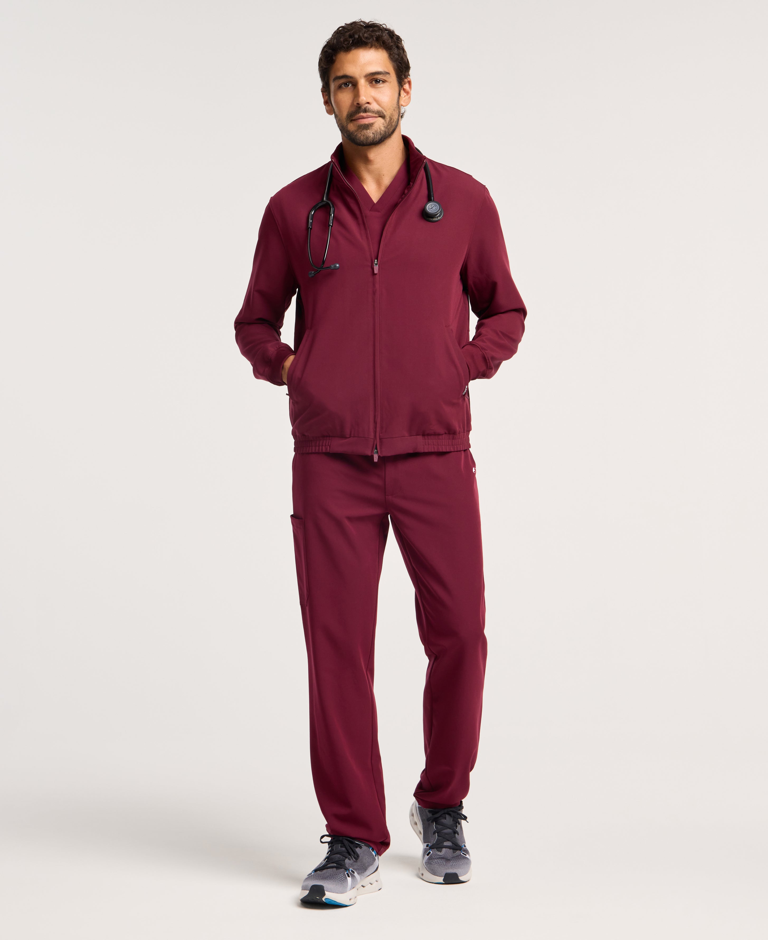 Jaanuu Wolfe 6-Pocket Scrub Jacket in Burgundy, product photo 1 of 6
