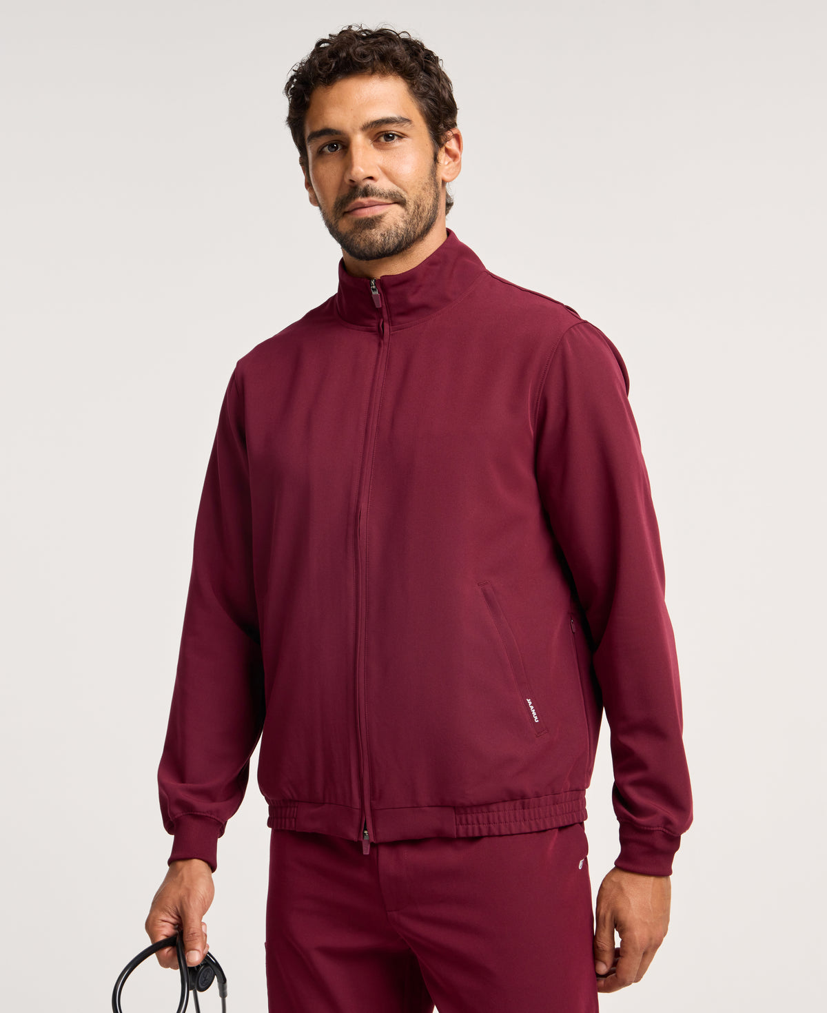 Jaanuu Wolfe 6-Pocket Scrub Jacket in Burgundy, product photo 2 of 6