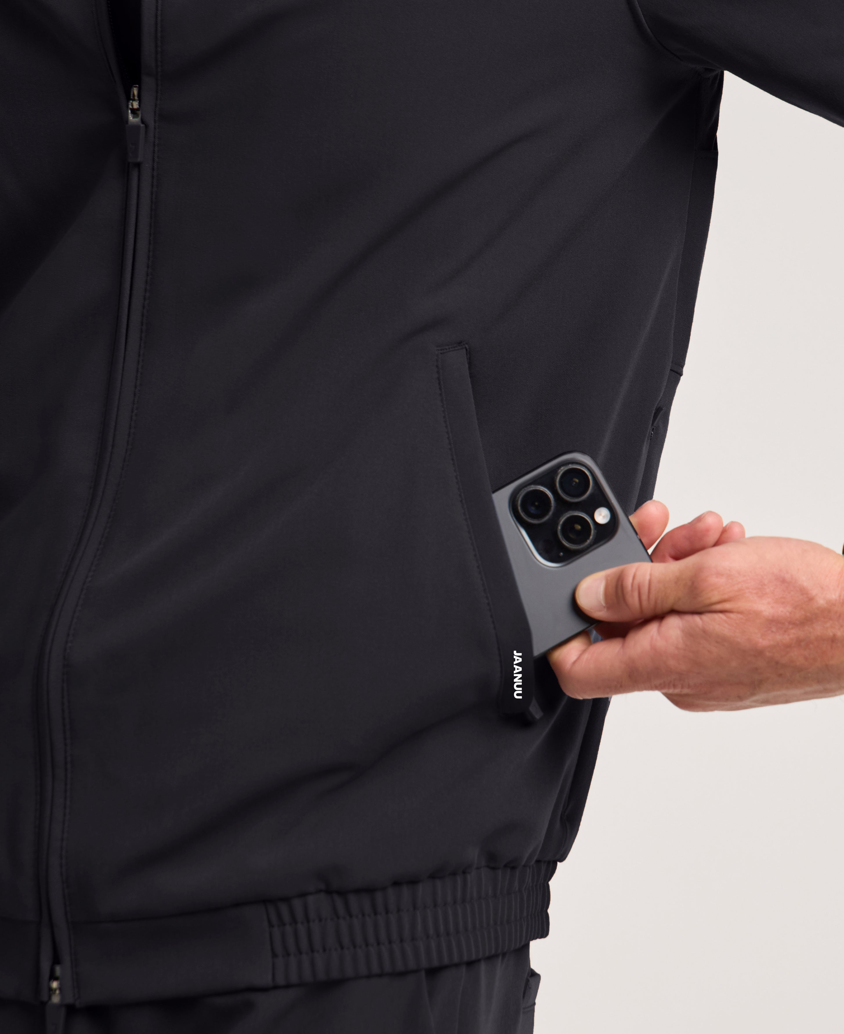 Jaanuu Wolfe 6-Pocket Scrub Jacket in Black, product photo 4 of 6