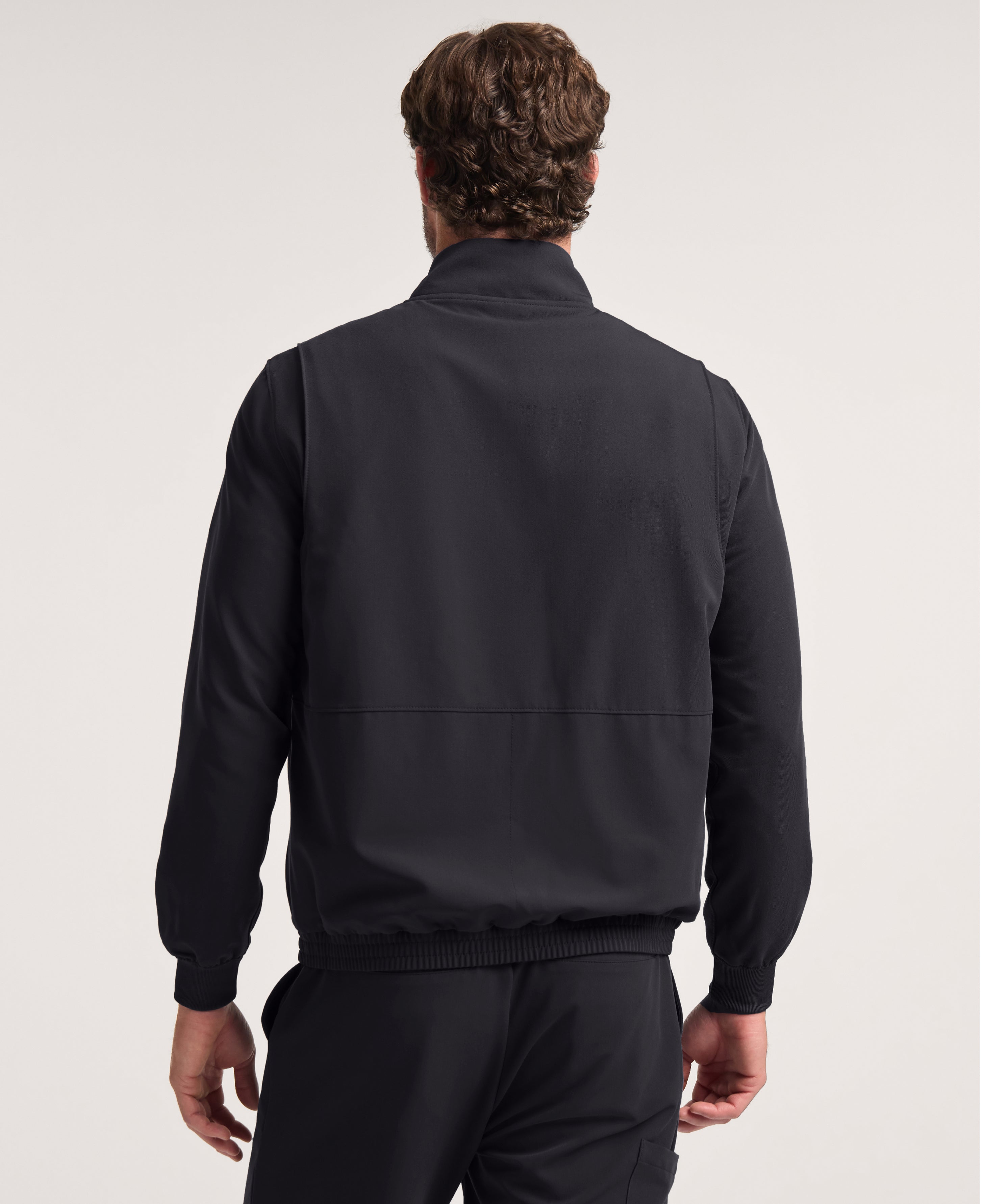 Jaanuu Wolfe 6-Pocket Scrub Jacket in Black, product photo 6 of 6