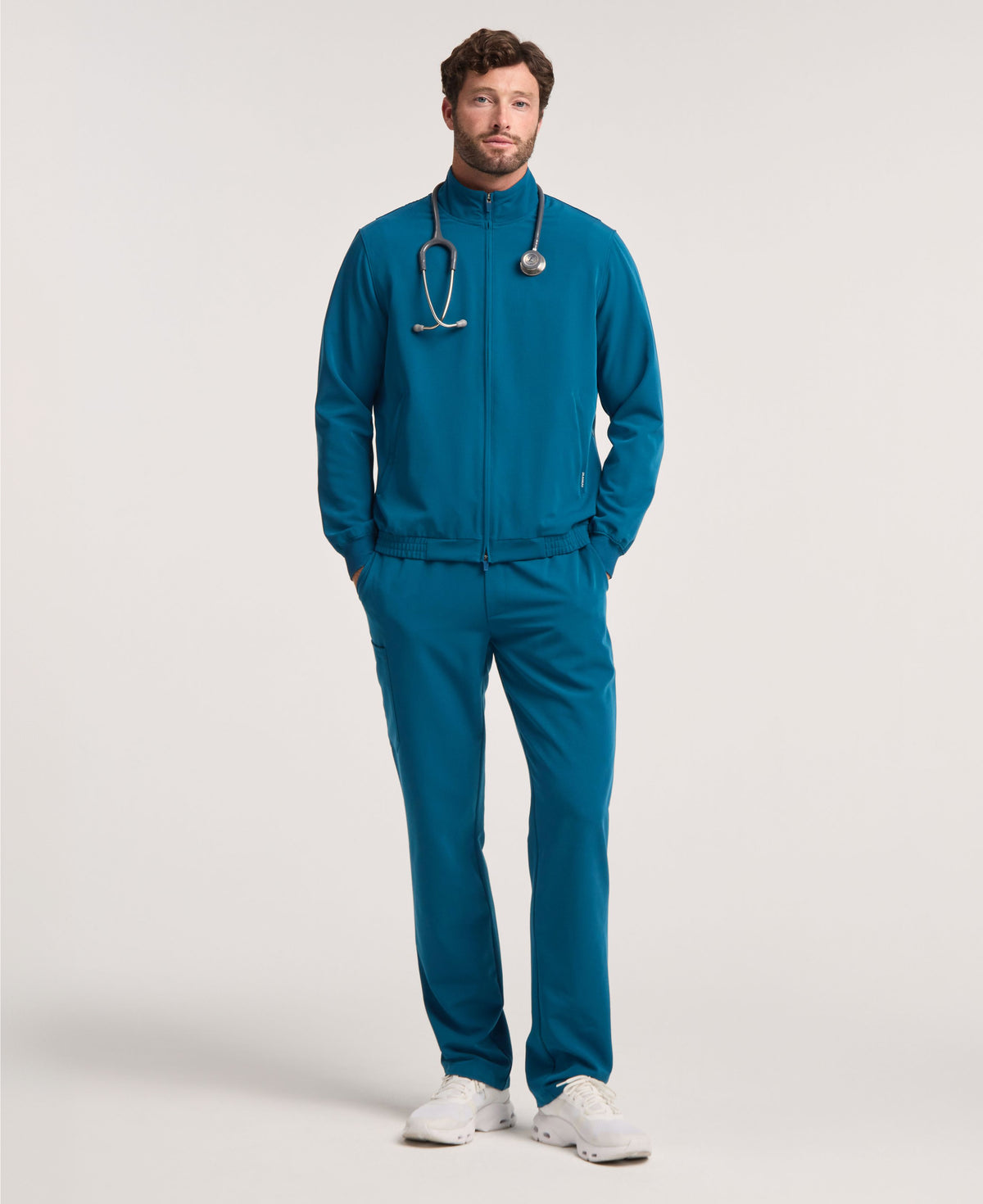 Jaanuu Wolfe 6-Pocket Scrub Jacket in Caribbean Blue, product photo 2 of 6