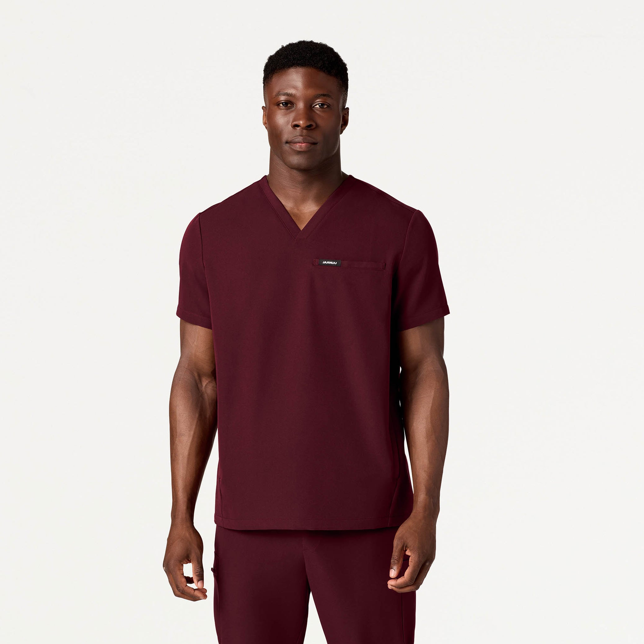 Man wearing Burgundy scrub top