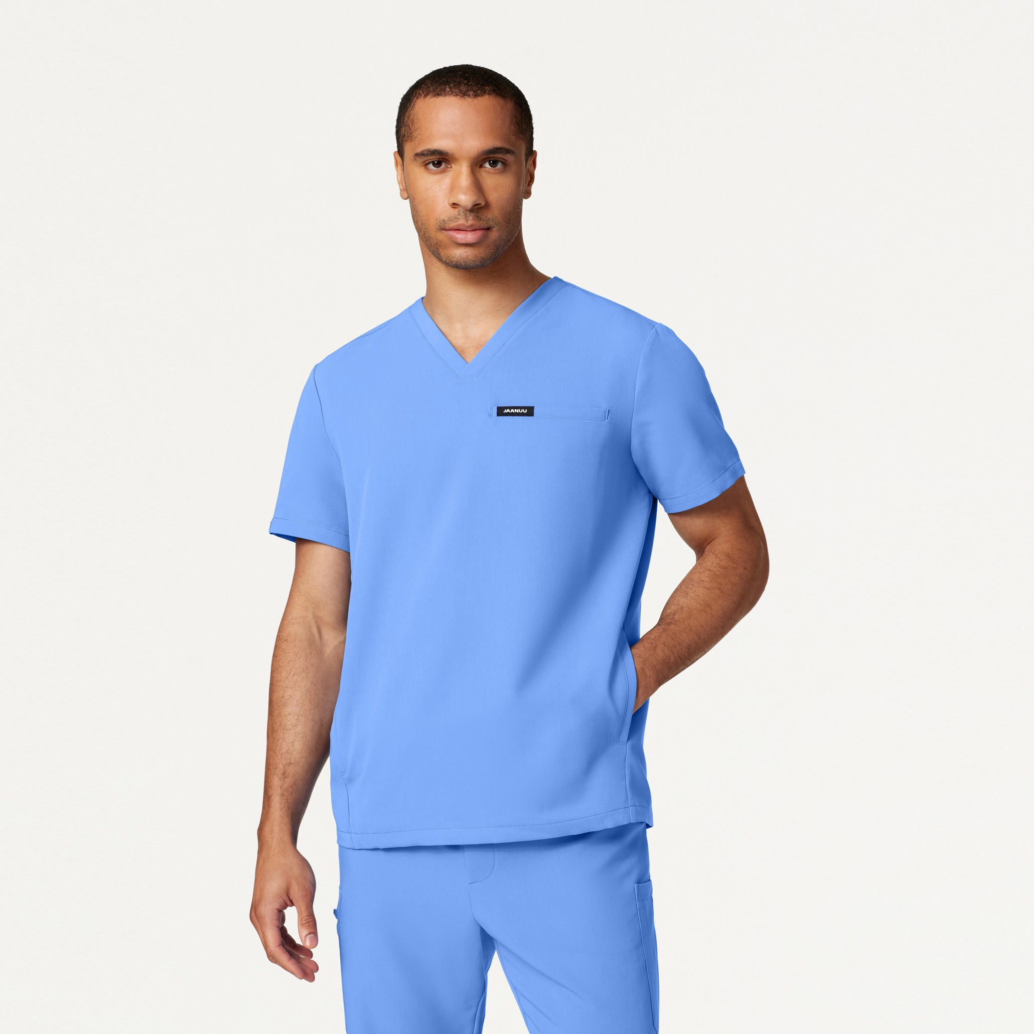 Man wearing Ceil Blue scrub top
