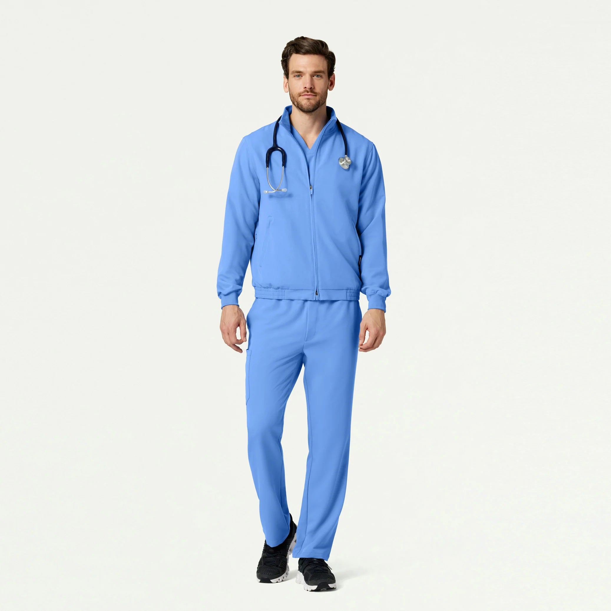 Man wearing Ceil Blue scrub set with Ceil Blue scrub jacket