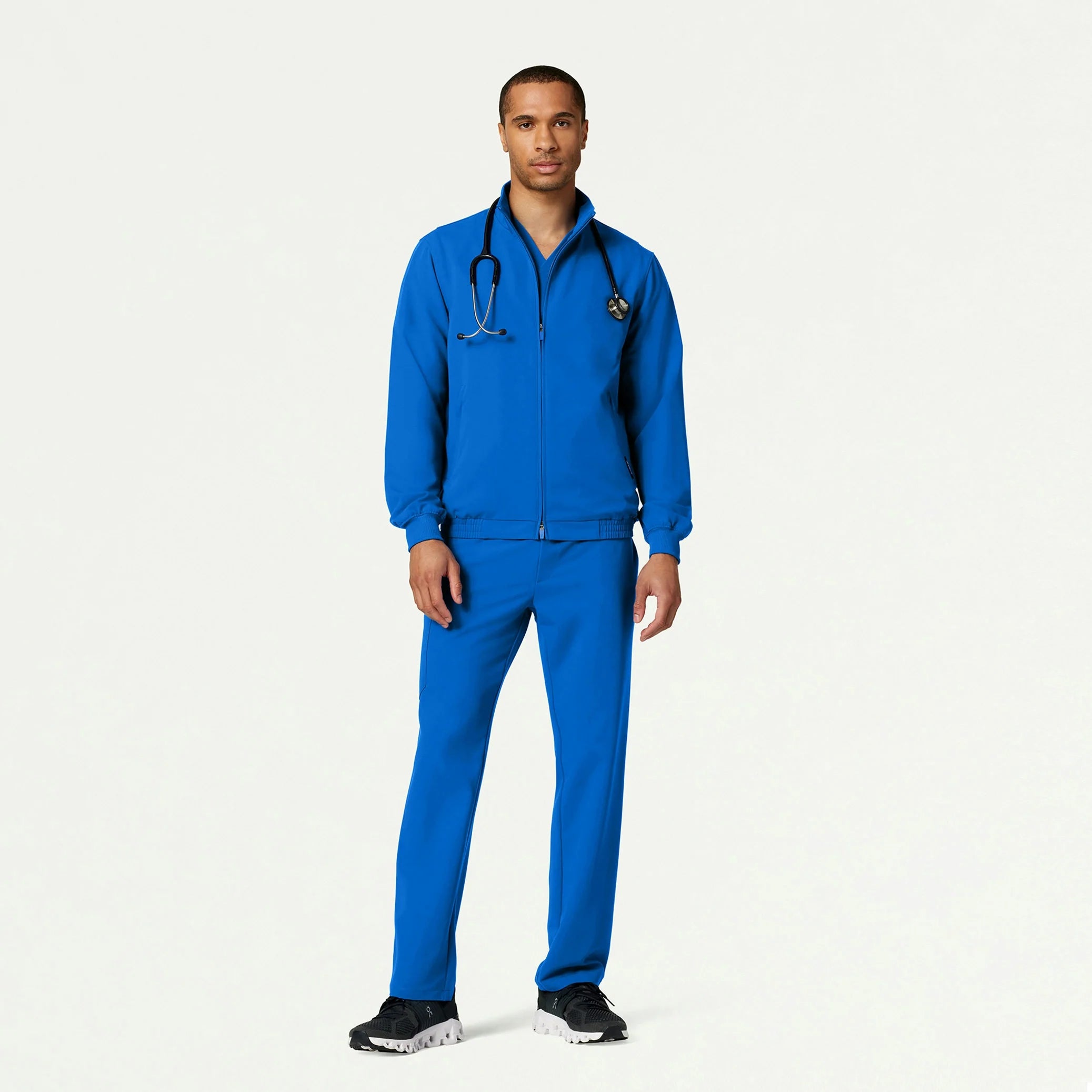 Man wearing Royal Blue scrub set with Royal Blue scrub jacket