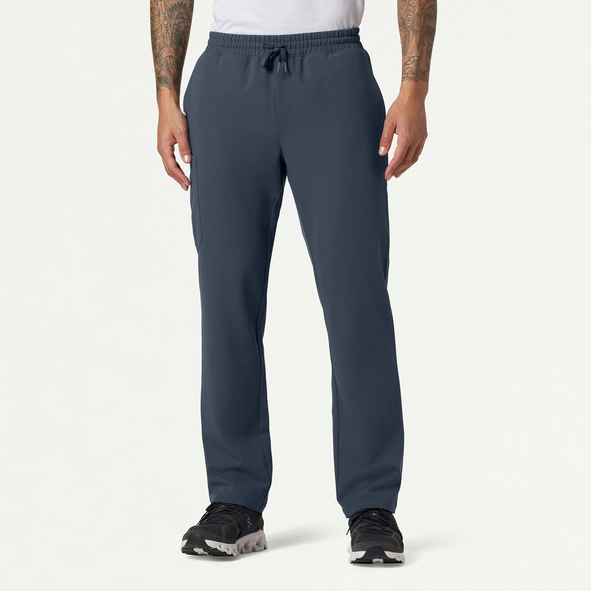 Man wearing Carbon Gray scrub pant