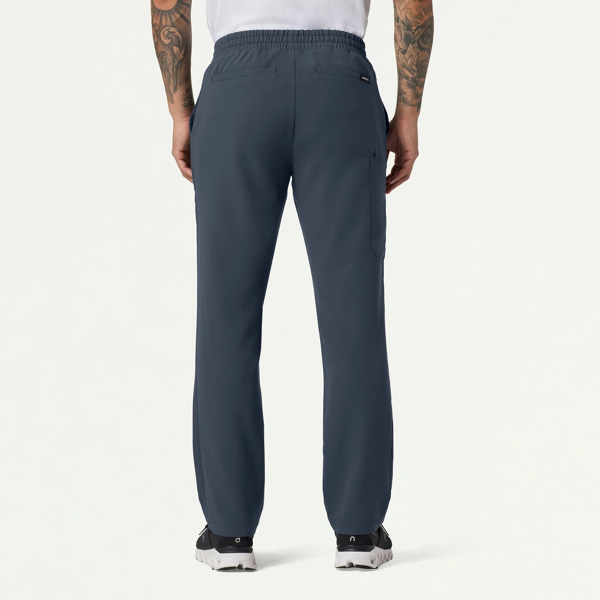 Man wearing Carbon Gray scrub pant