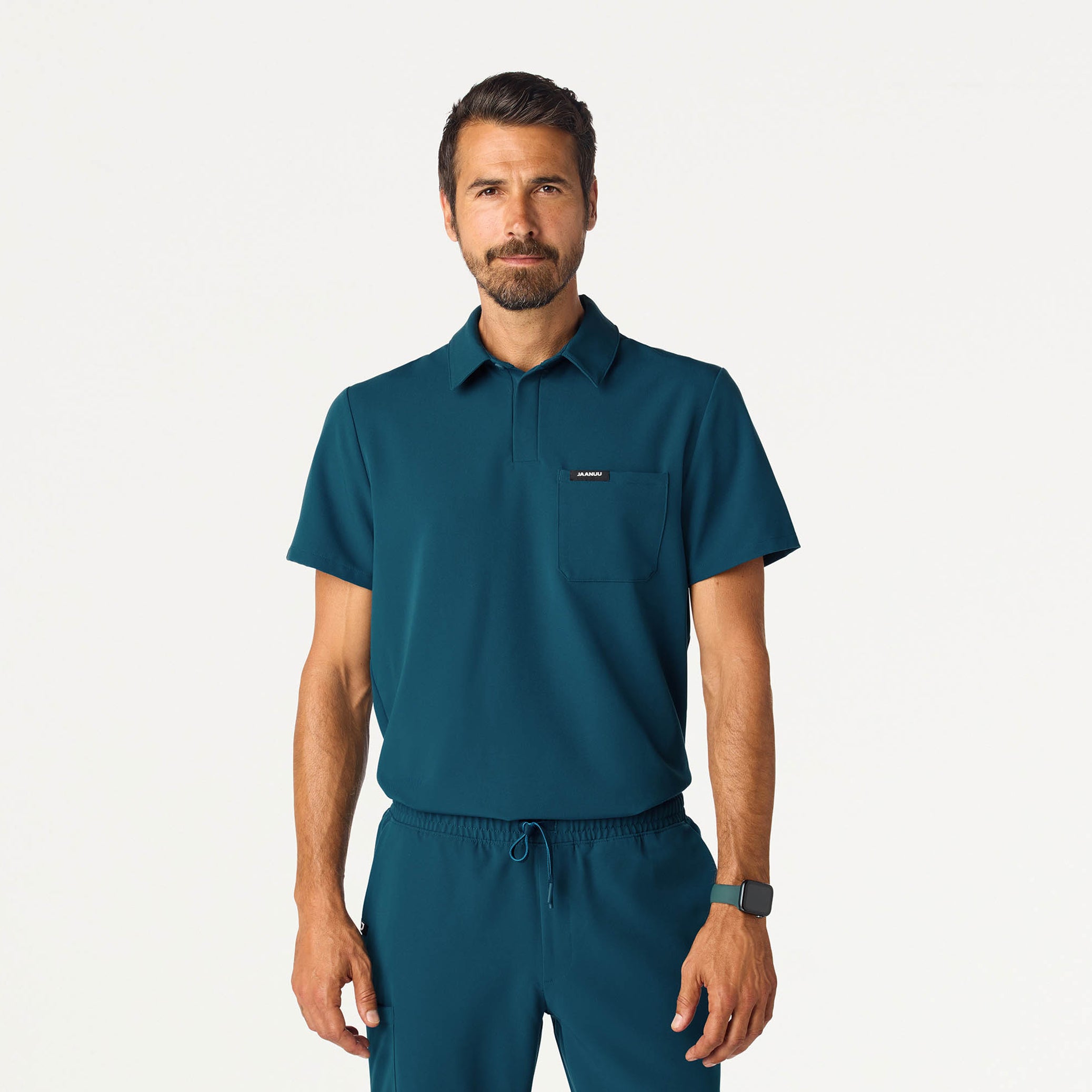 Man wearing a Caribbean Blue scrub top