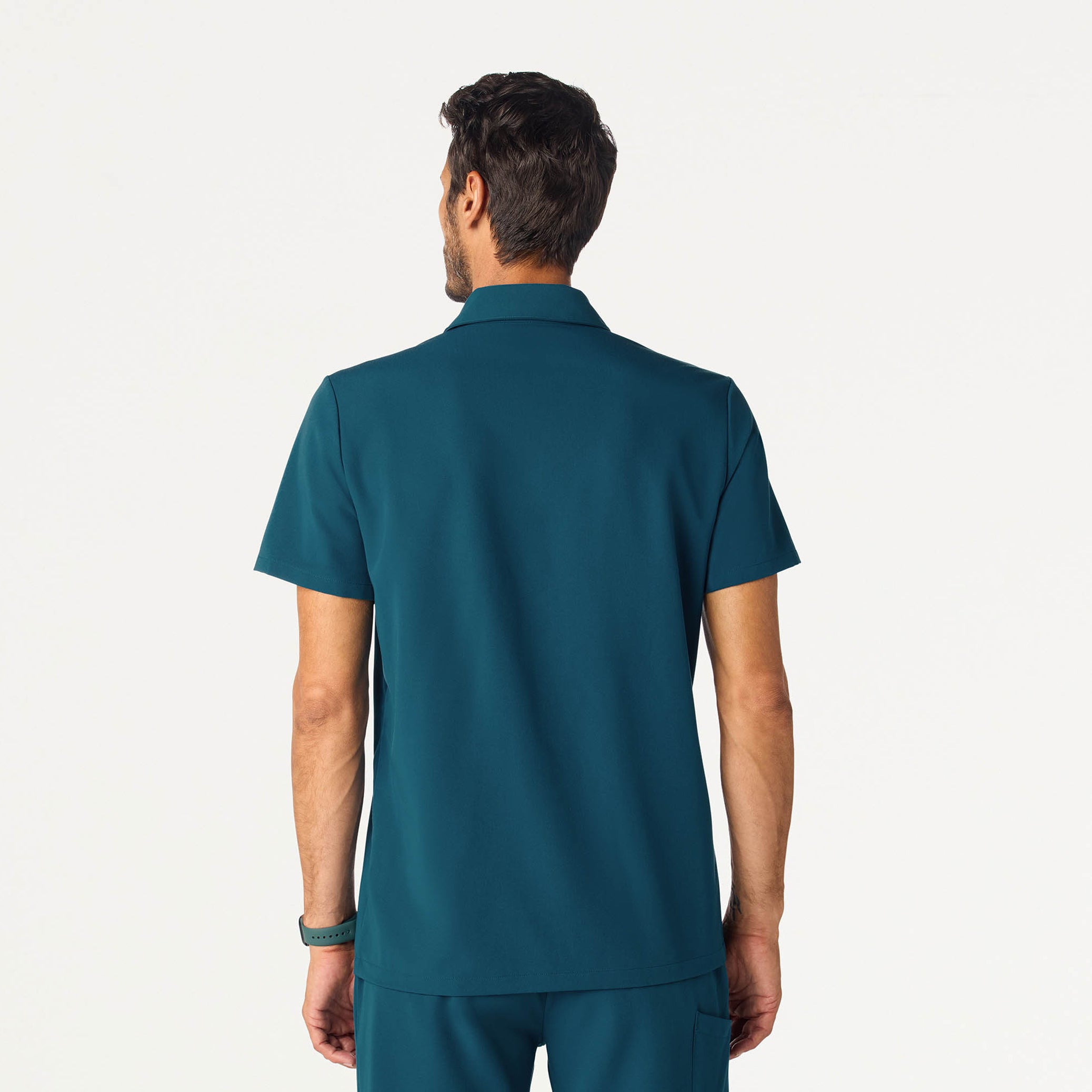 Man wearing a Caribbean Blue scrub top