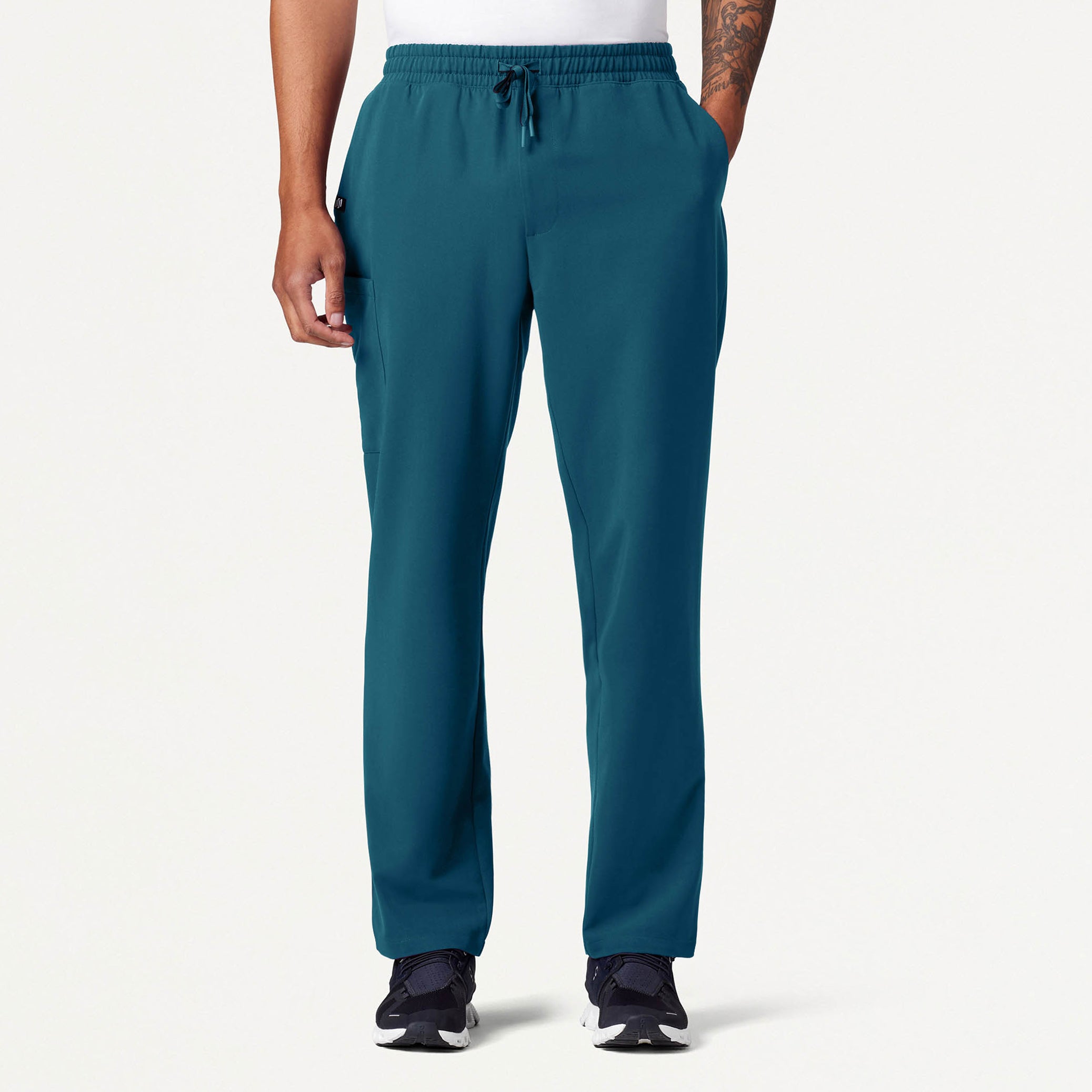 Man wearing a Caribbean Blue scrub  pant