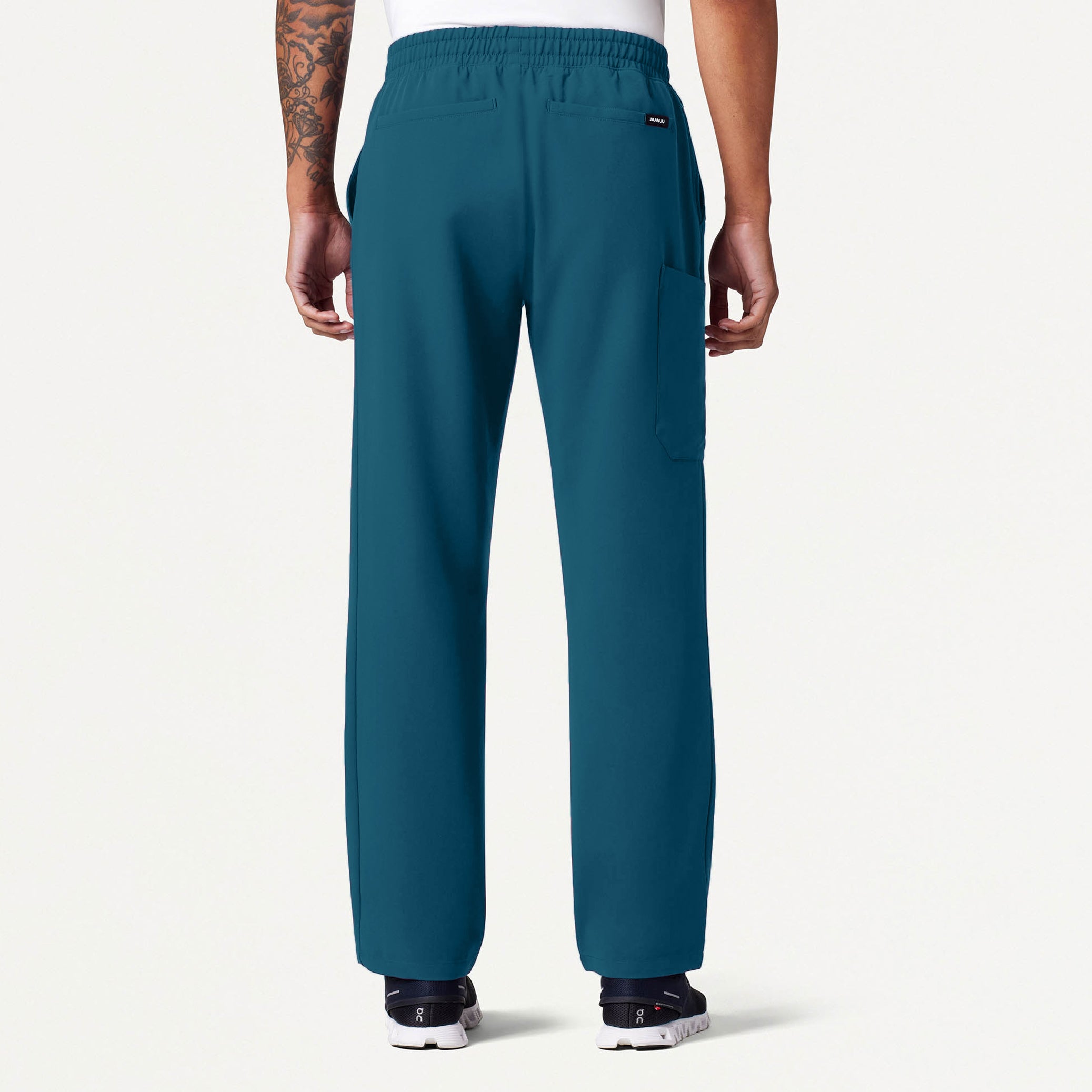 Man wearing a Caribbean Blue scrub pant