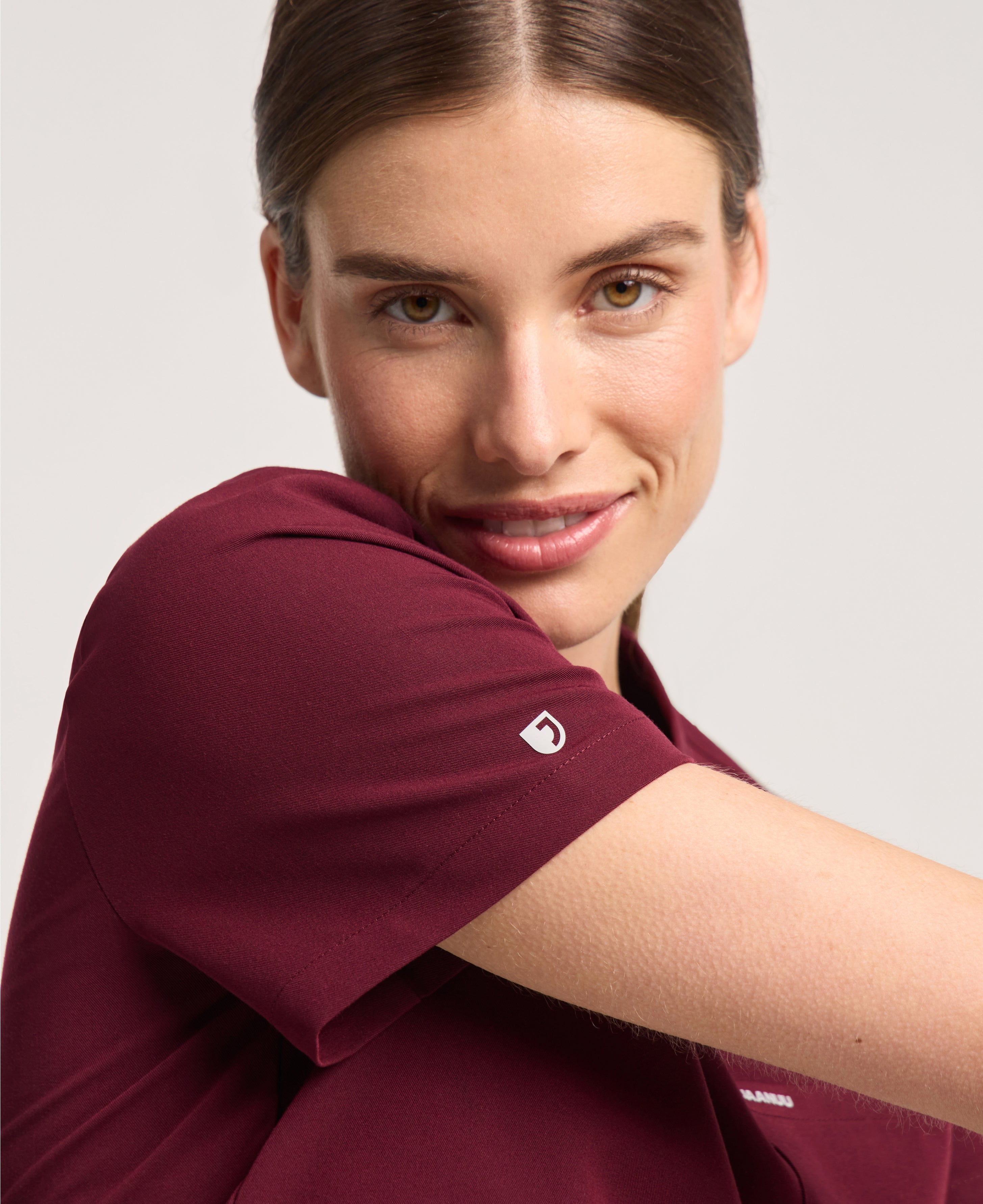 Jaanuu Rhena 1-Pocket Scrub Top in Burgundy, product photo 3 of 6