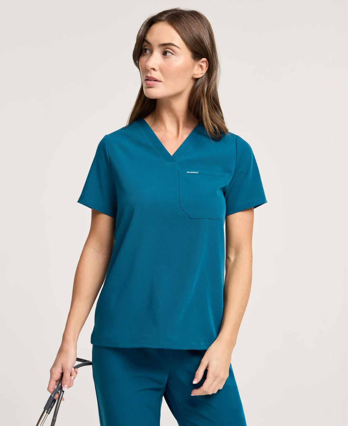 Jaanuu Rhena 1-Pocket Scrub Top in Caribbean Blue, product photo 2 of 6