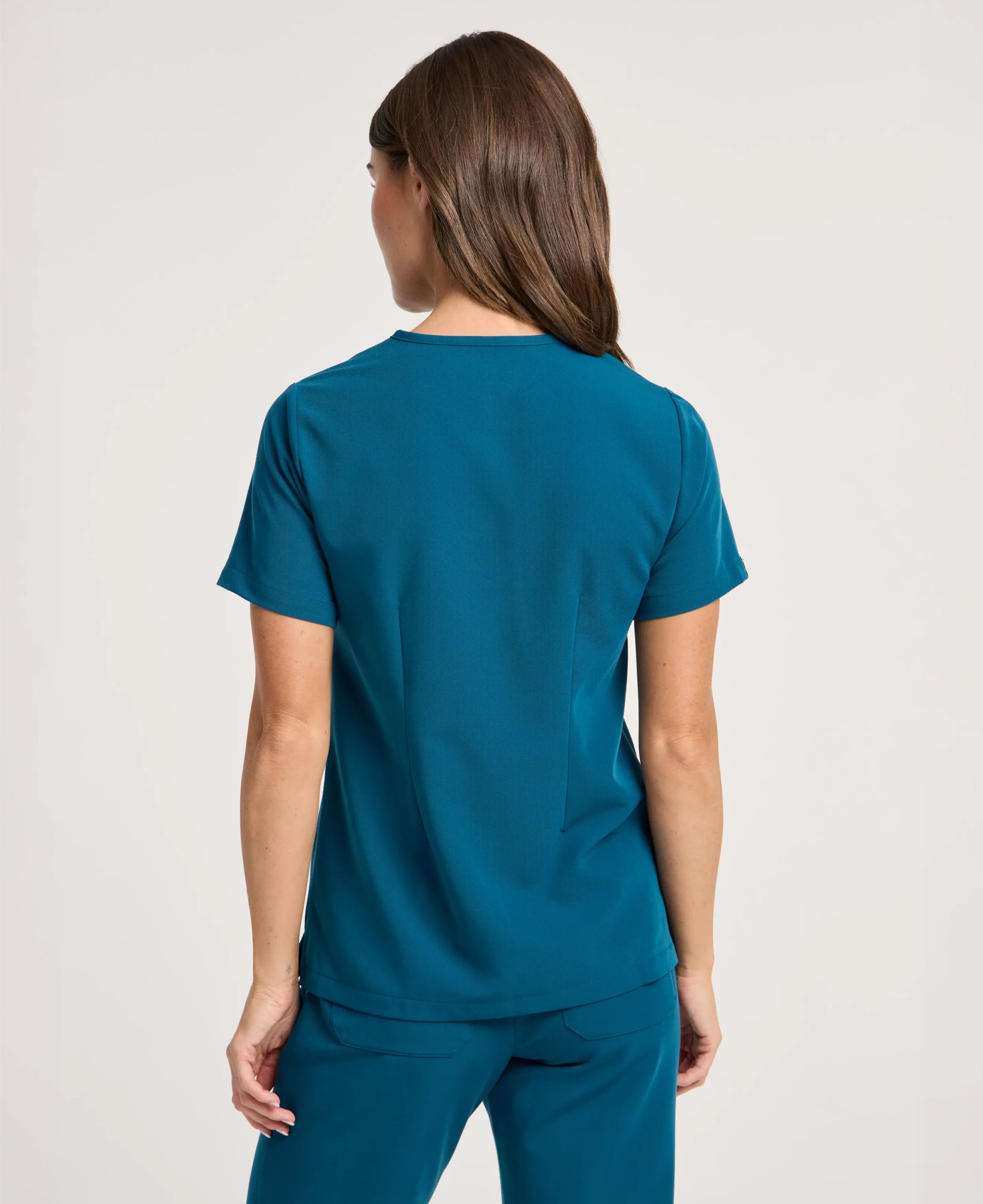 Jaanuu Rhena 1-Pocket Scrub Top in Caribbean Blue, product photo 3 of 6
