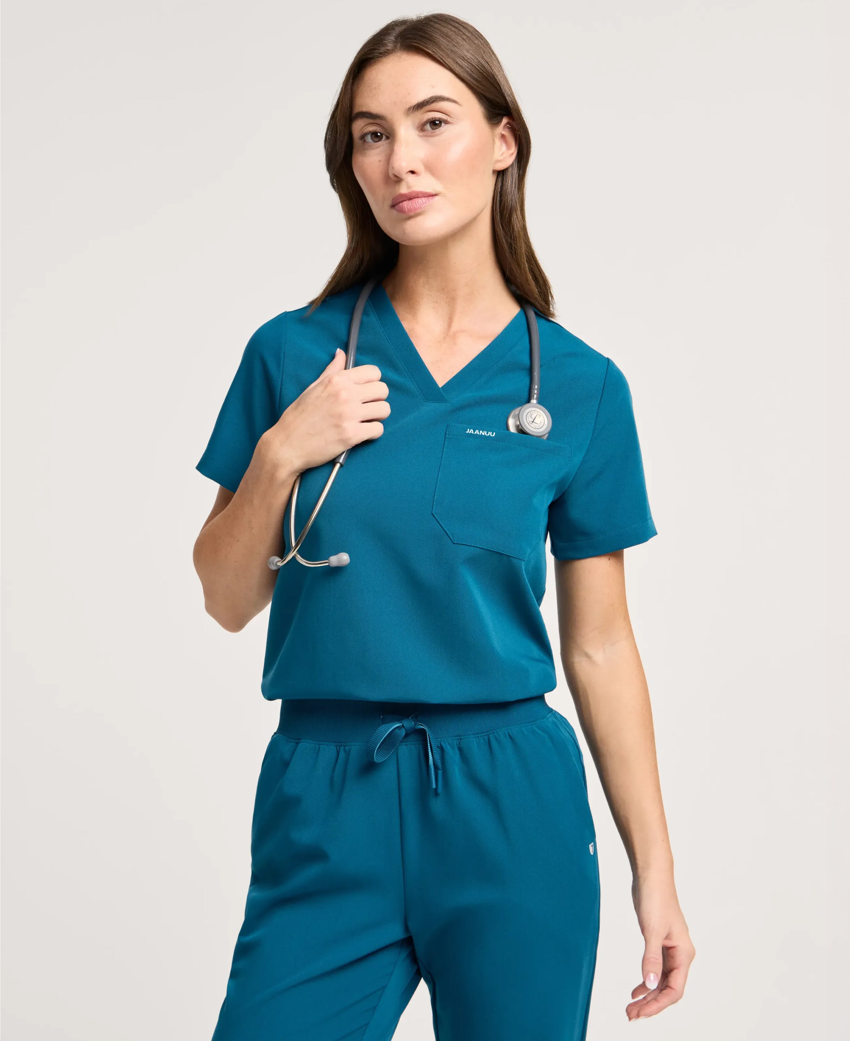 Jaanuu Rhena 1-Pocket Scrub Top in Caribbean Blue, product photo 6 of 6