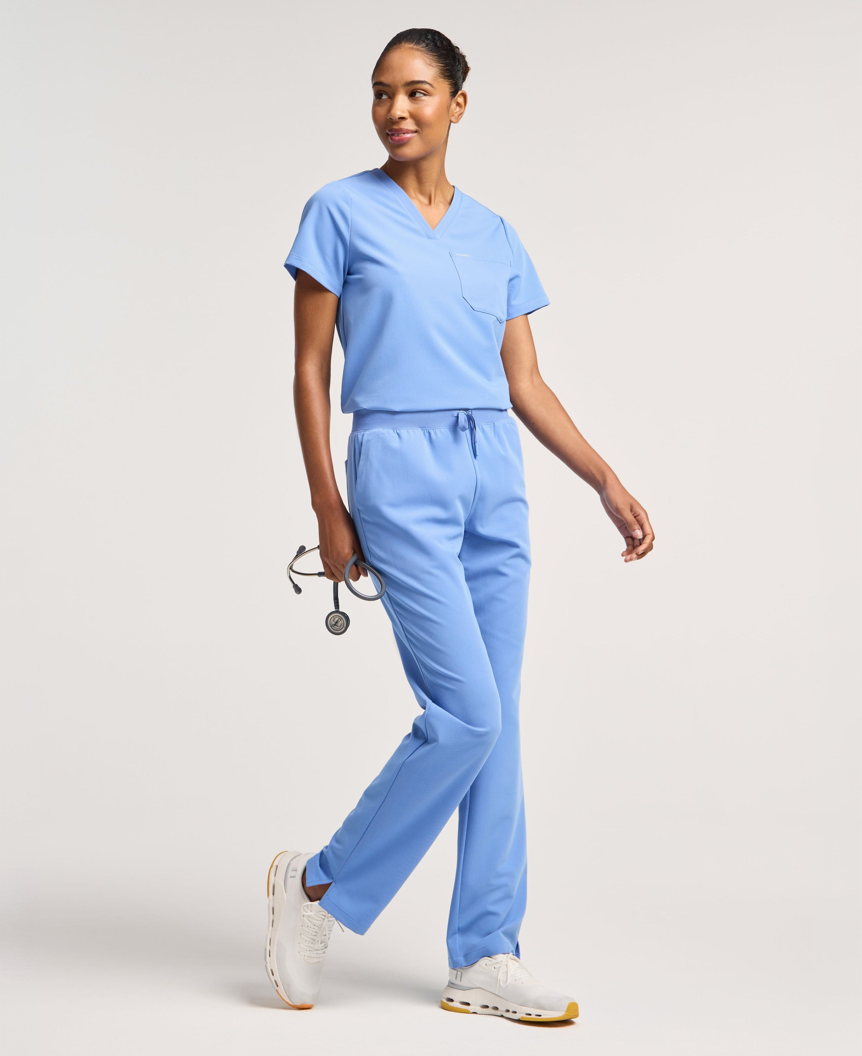Jaanuu Rhena 1-Pocket Scrub Top in Ceil Blue, product photo 2 of 6