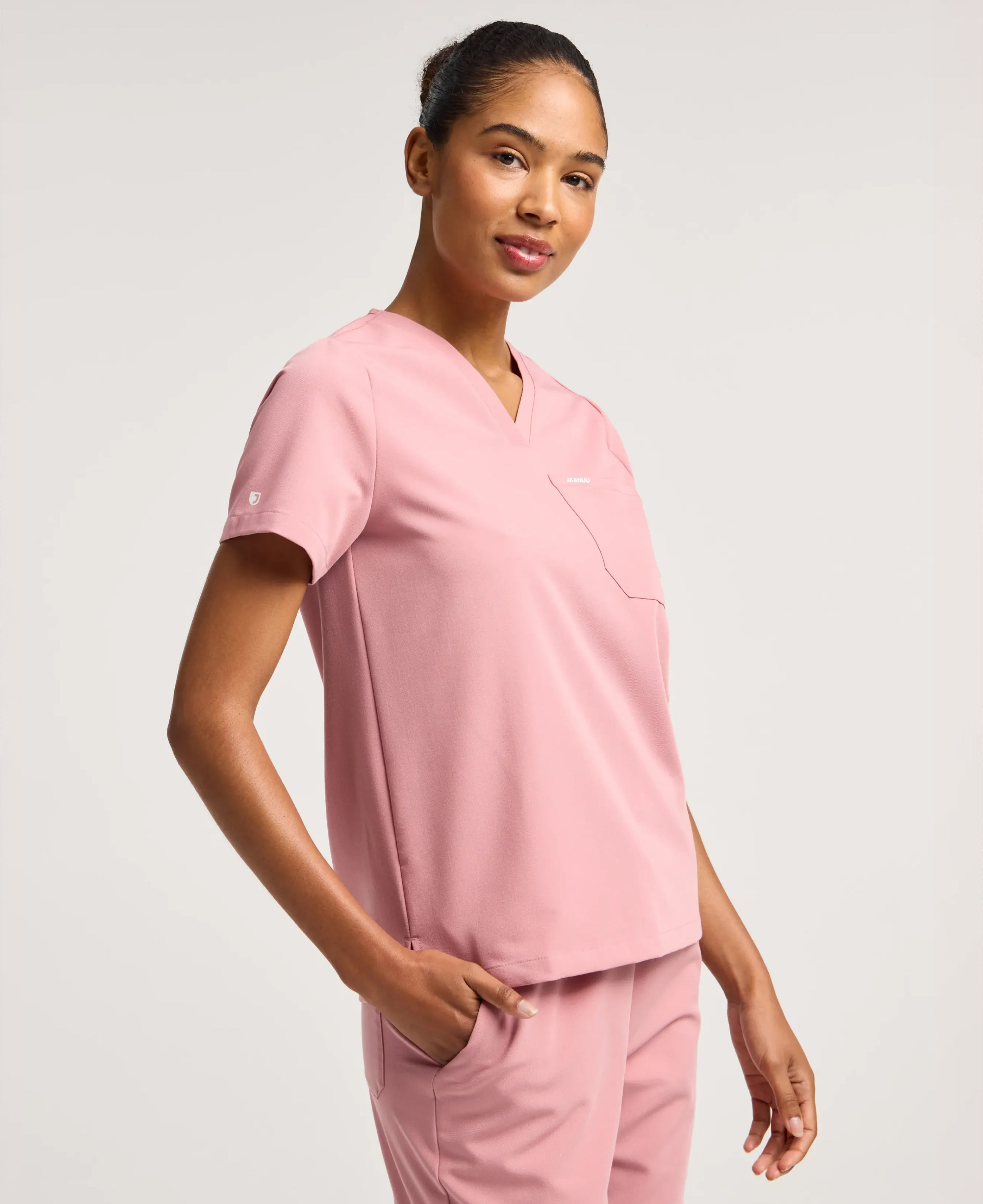Jaanuu Rhena 1-Pocket Scrub Top in Mauve, product photo 4 of 6