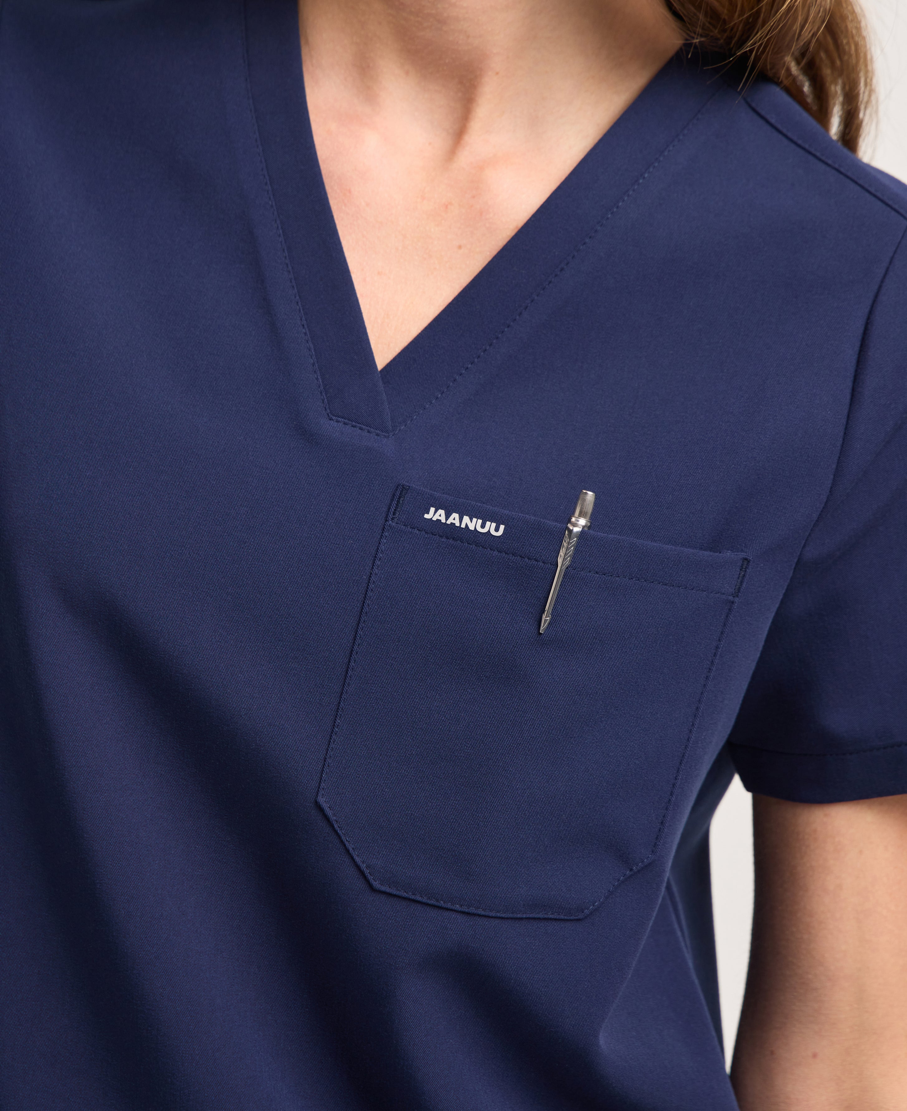Jaanuu Rhena 1-Pocket Scrub Top in Midnight Navy, product photo 4 of 6