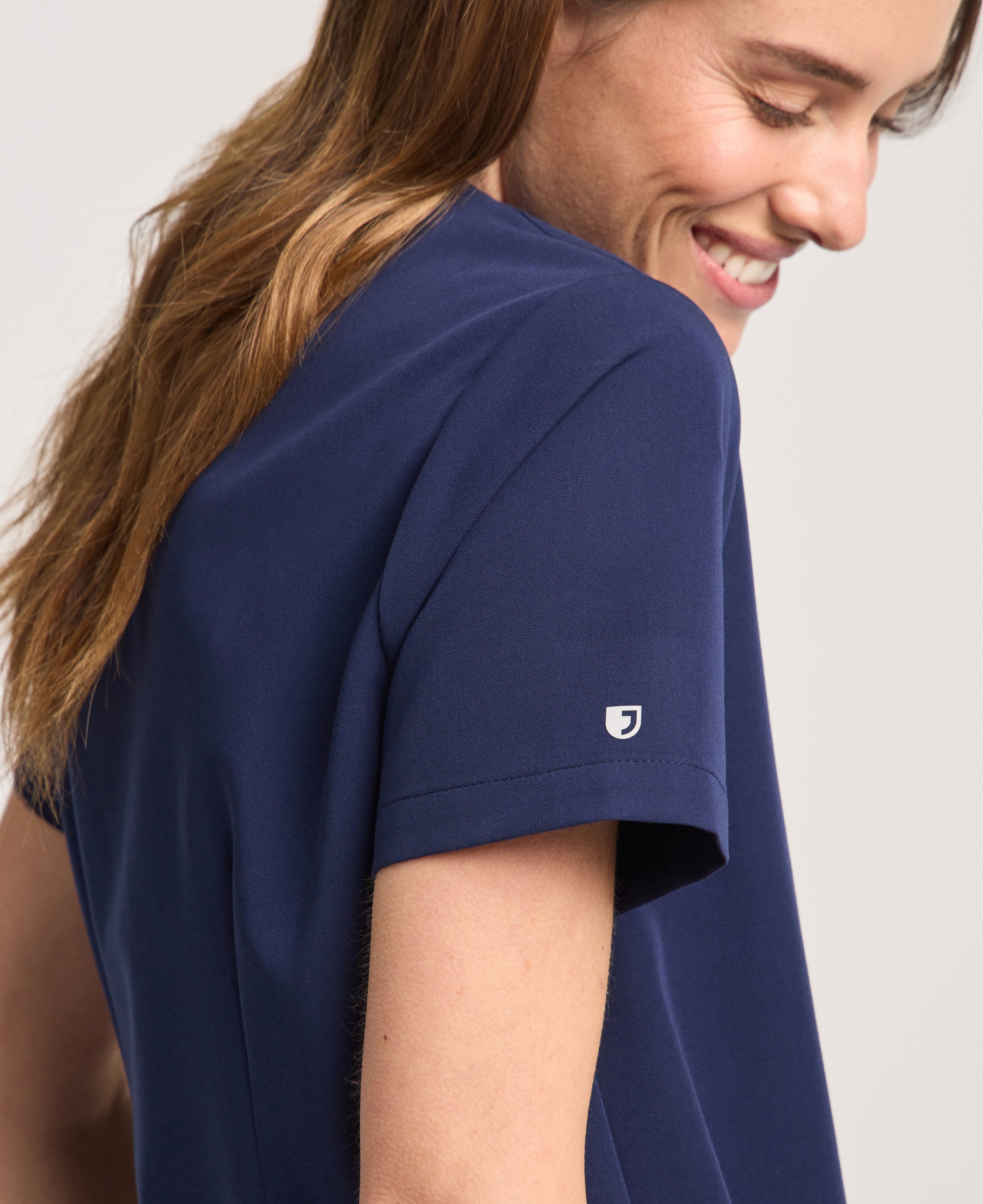 Jaanuu Rhena 1-Pocket Scrub Top in Midnight Navy, product photo 5 of 6