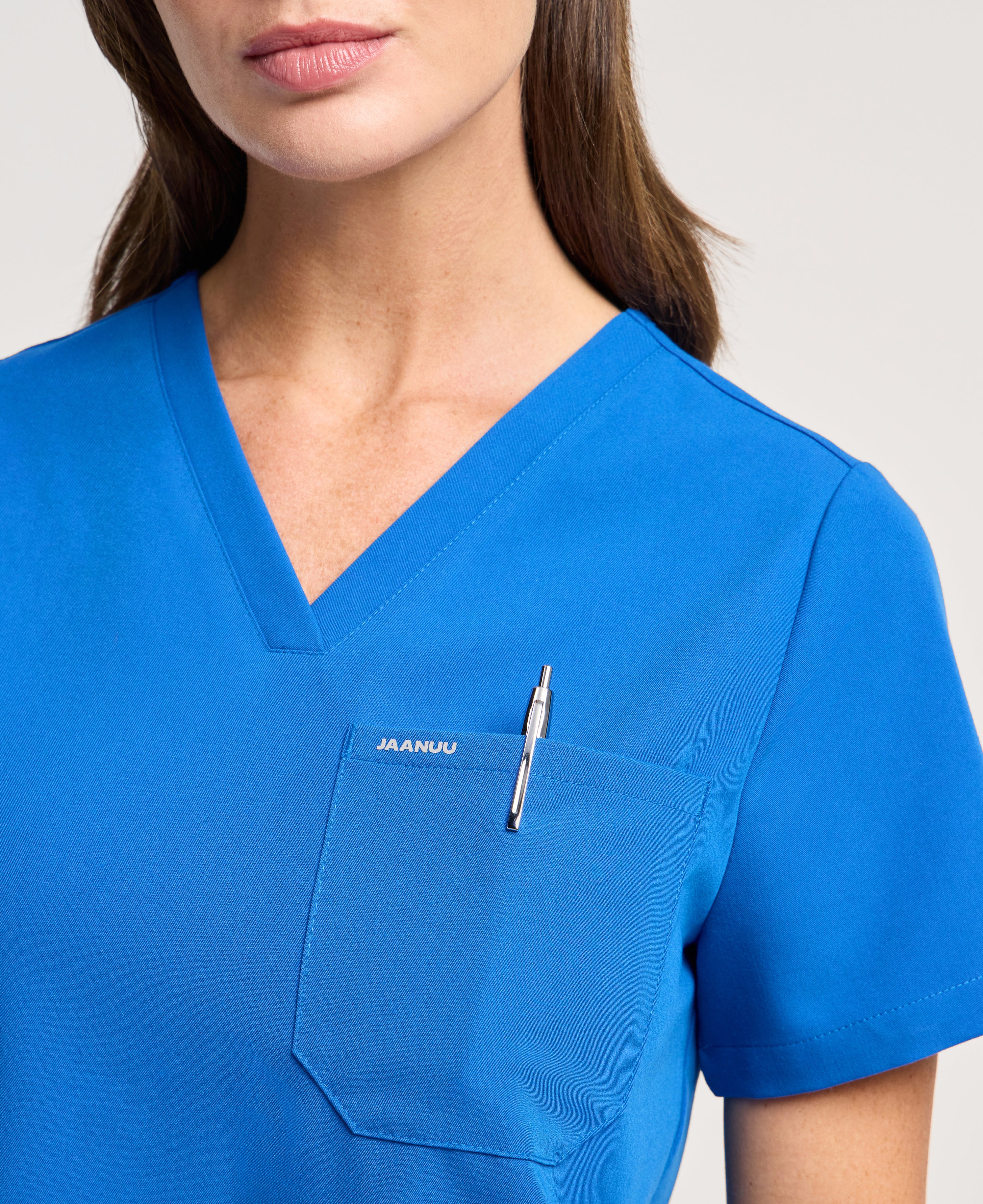Jaanuu Rhena 1-Pocket Scrub Top in Royal Blue, product photo 4 of 6