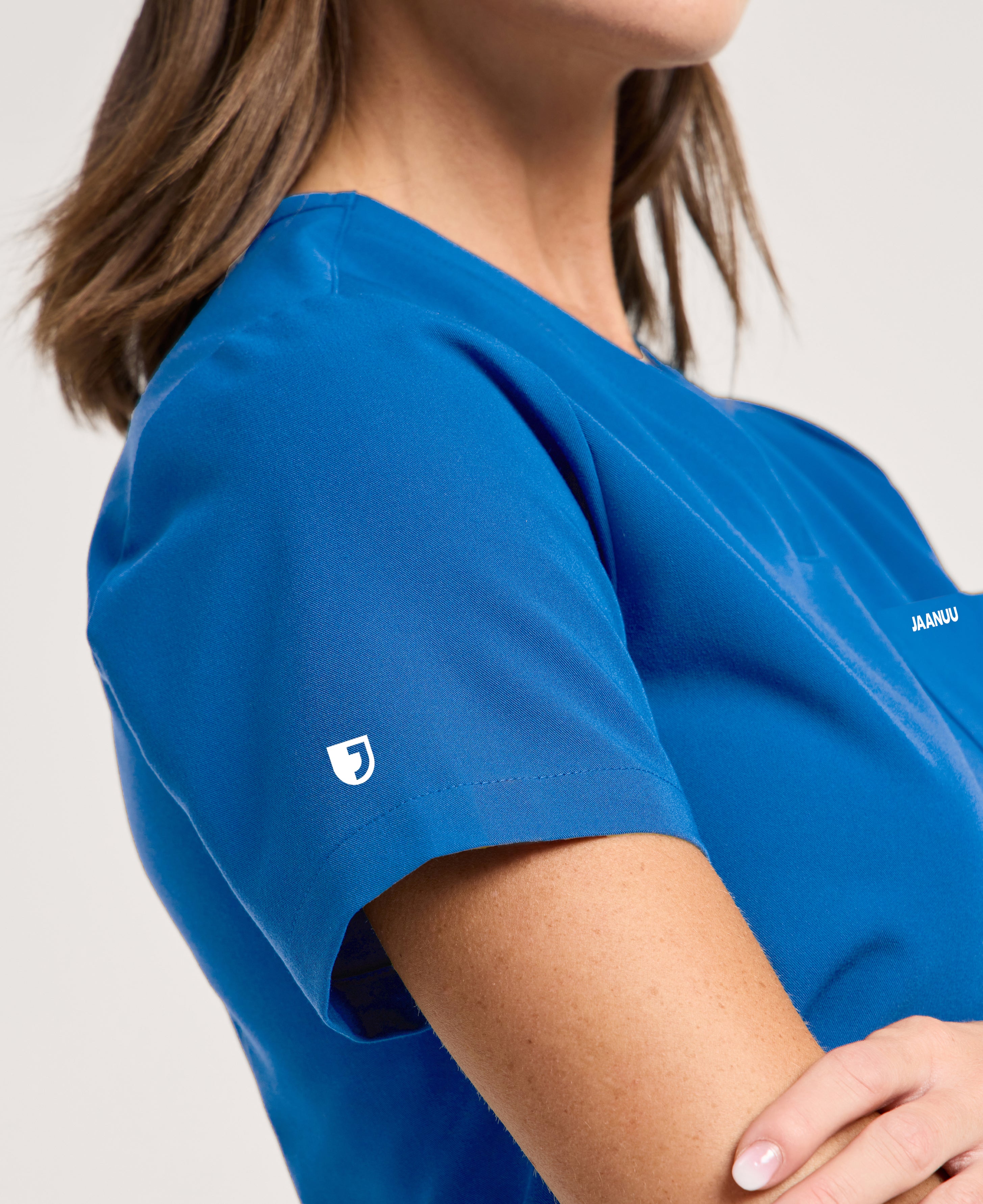 Jaanuu Rhena 1-Pocket Scrub Top in Royal Blue, product photo 5 of 6