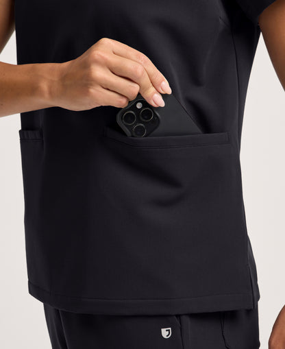 Jaanuu Helia Notched V-Neck Scrub Top in Black, product photo 4 of 6