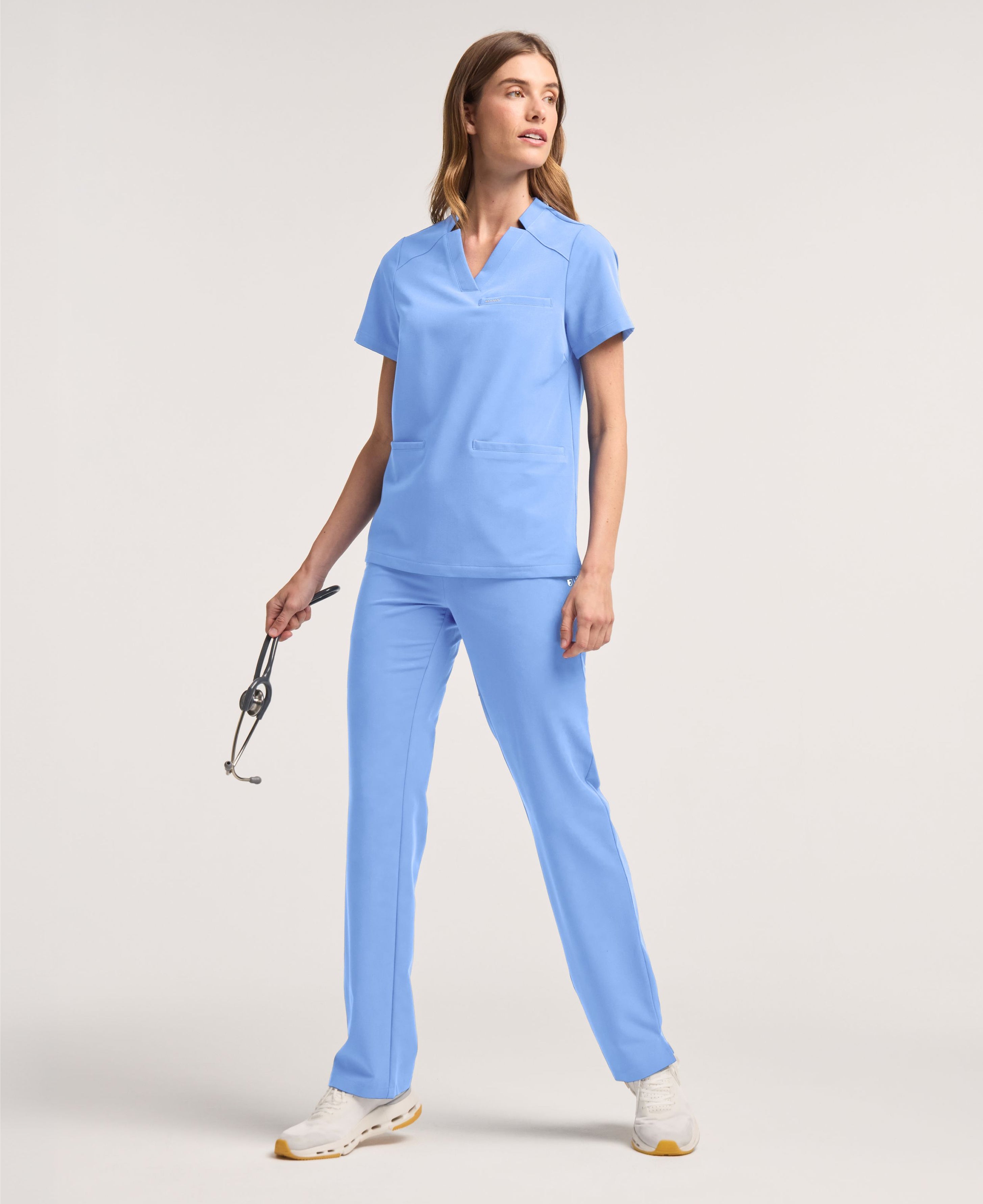 Jaanuu Helia Notched V-Neck Scrub Top in Ceil Blue, product photo 2 of 6