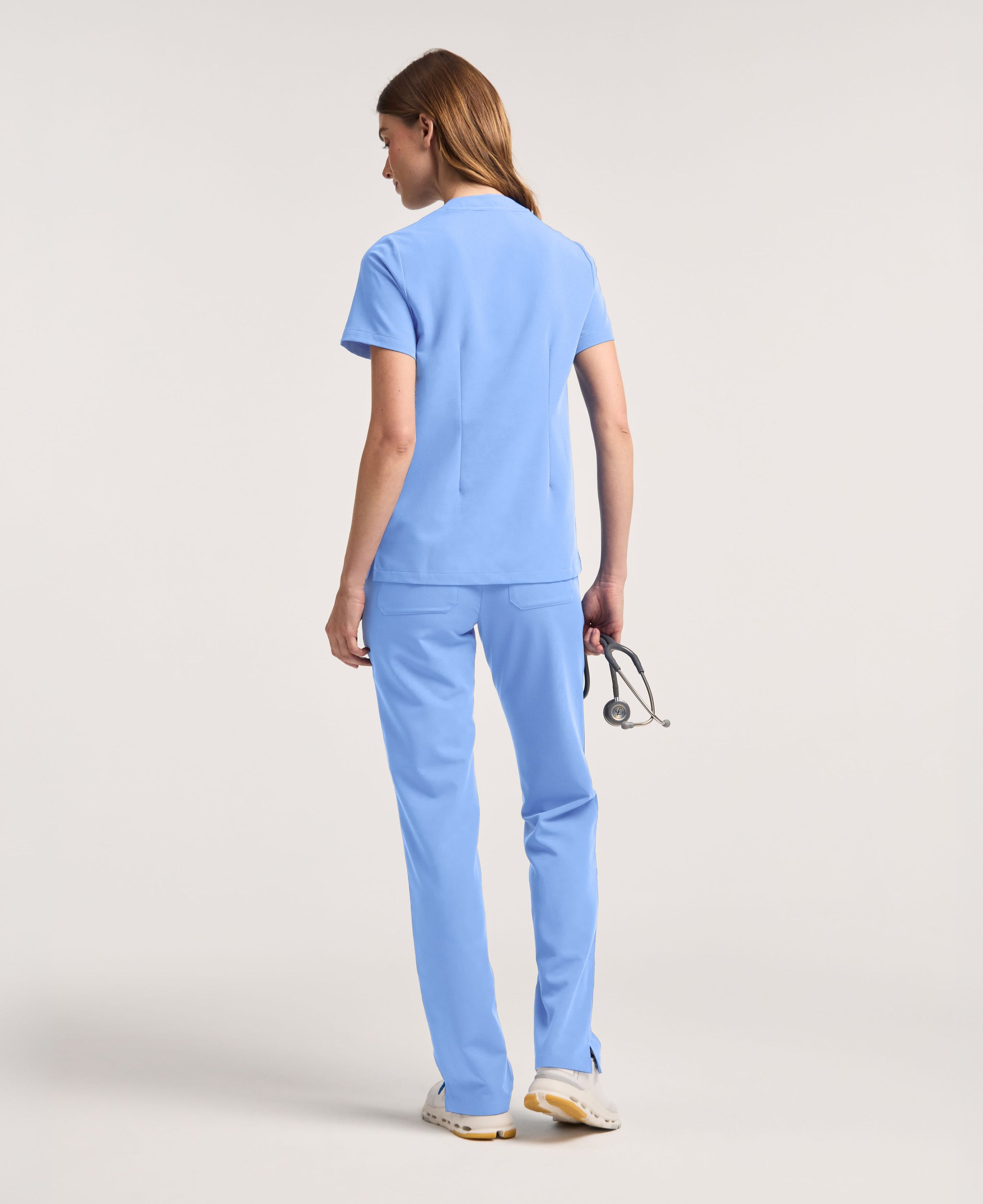 Jaanuu Helia Notched V-Neck Scrub Top in Ceil Blue, product photo 6 of 6