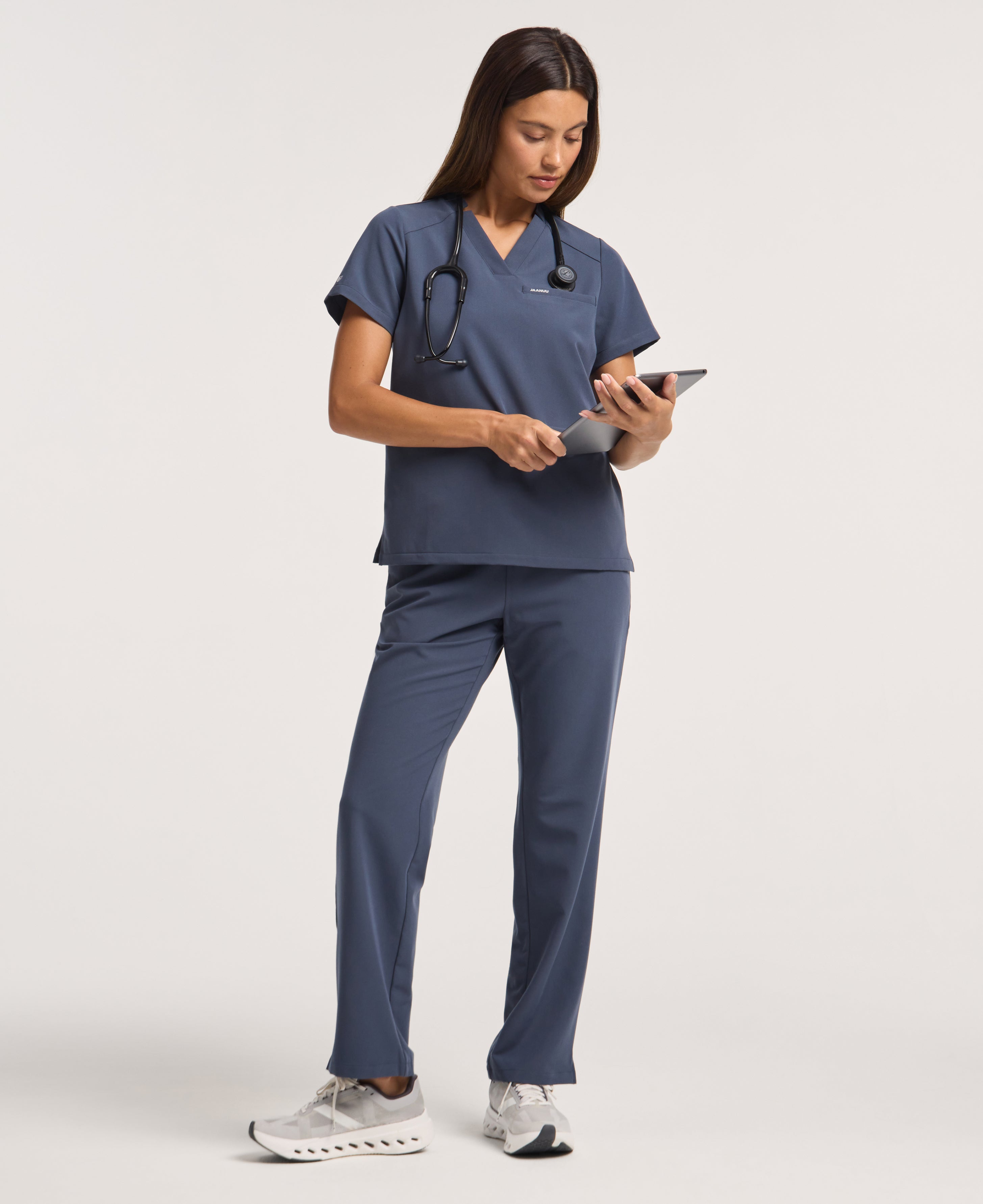 Jaanuu Helia Notched V-Neck Scrub Top in Carbon Gray, product photo 2 of 6