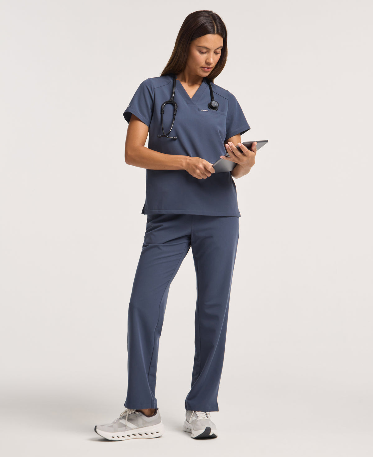 Jaanuu Helia Notched V-Neck Scrub Top in Carbon Gray, product photo 2 of 6