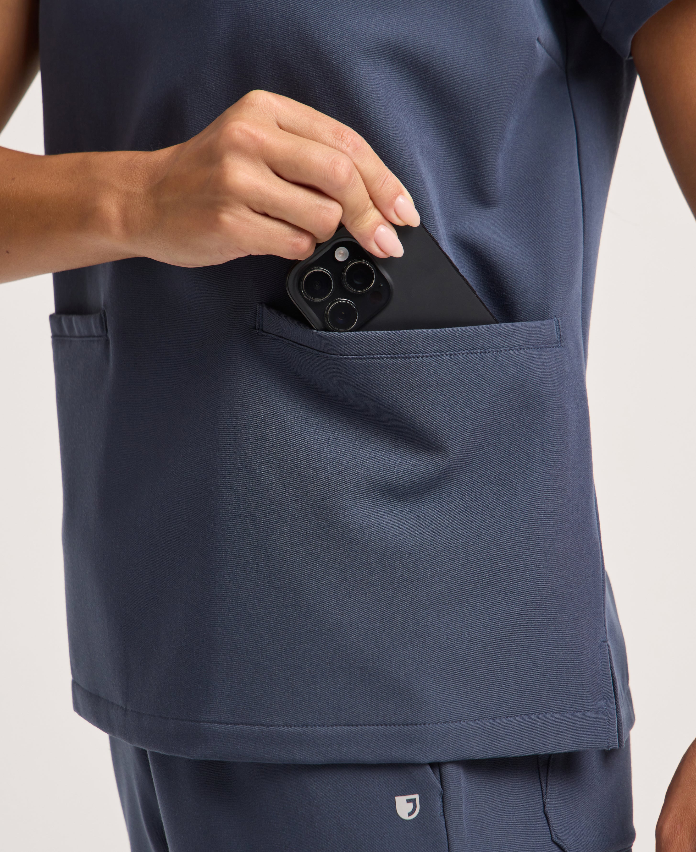 Jaanuu Helia Notched V-Neck Scrub Top in Carbon Gray, product photo 3 of 6