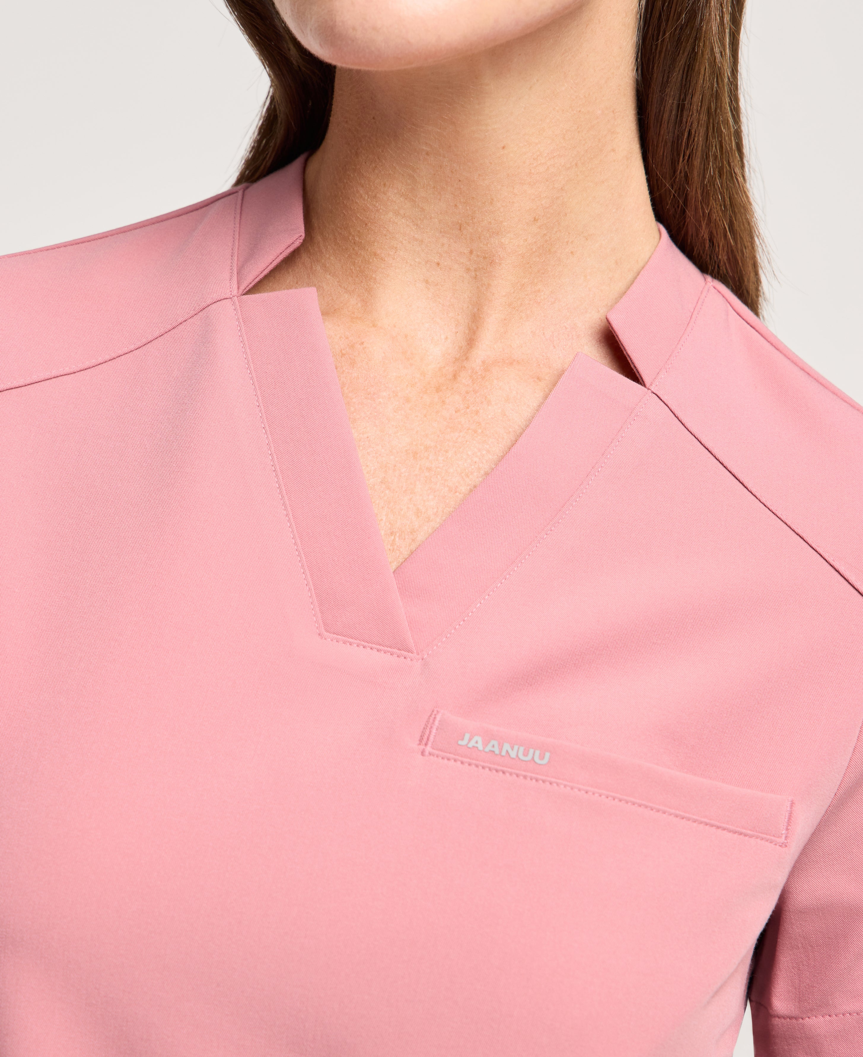 Jaanuu Helia Notched V-Neck Scrub Top in Mauve, product photo 4 of 6
