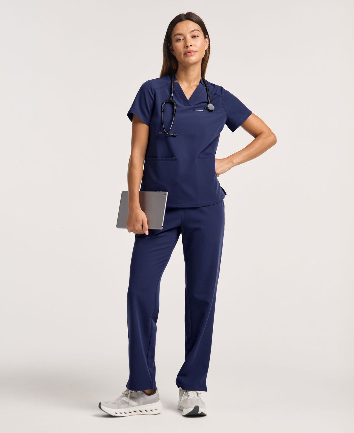 Jaanuu Helia Notched V-Neck Scrub Top in Midnight Navy, product photo 1 of 6