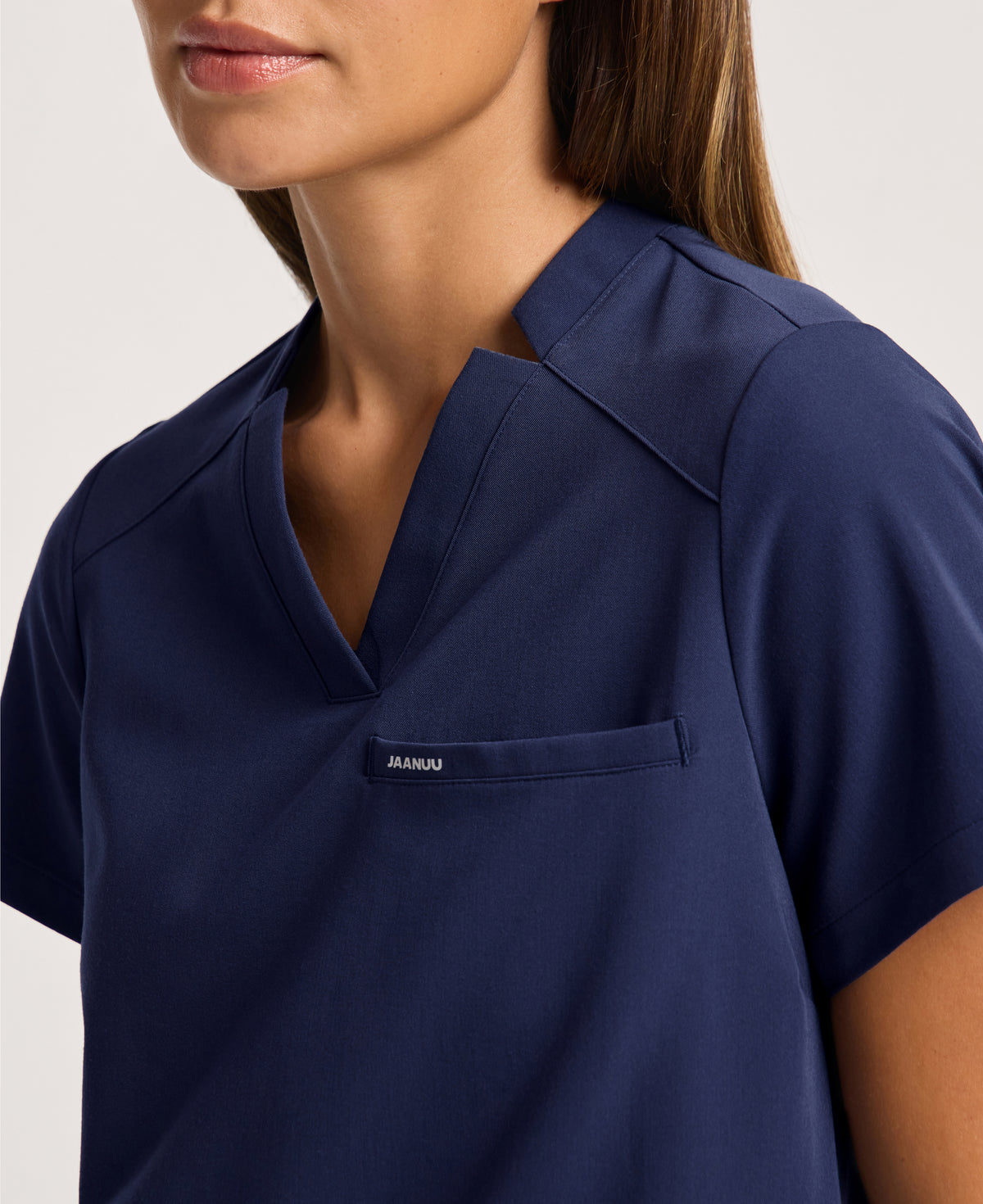 Jaanuu Helia Notched V-Neck Scrub Top in Midnight Navy, product photo 3 of 6